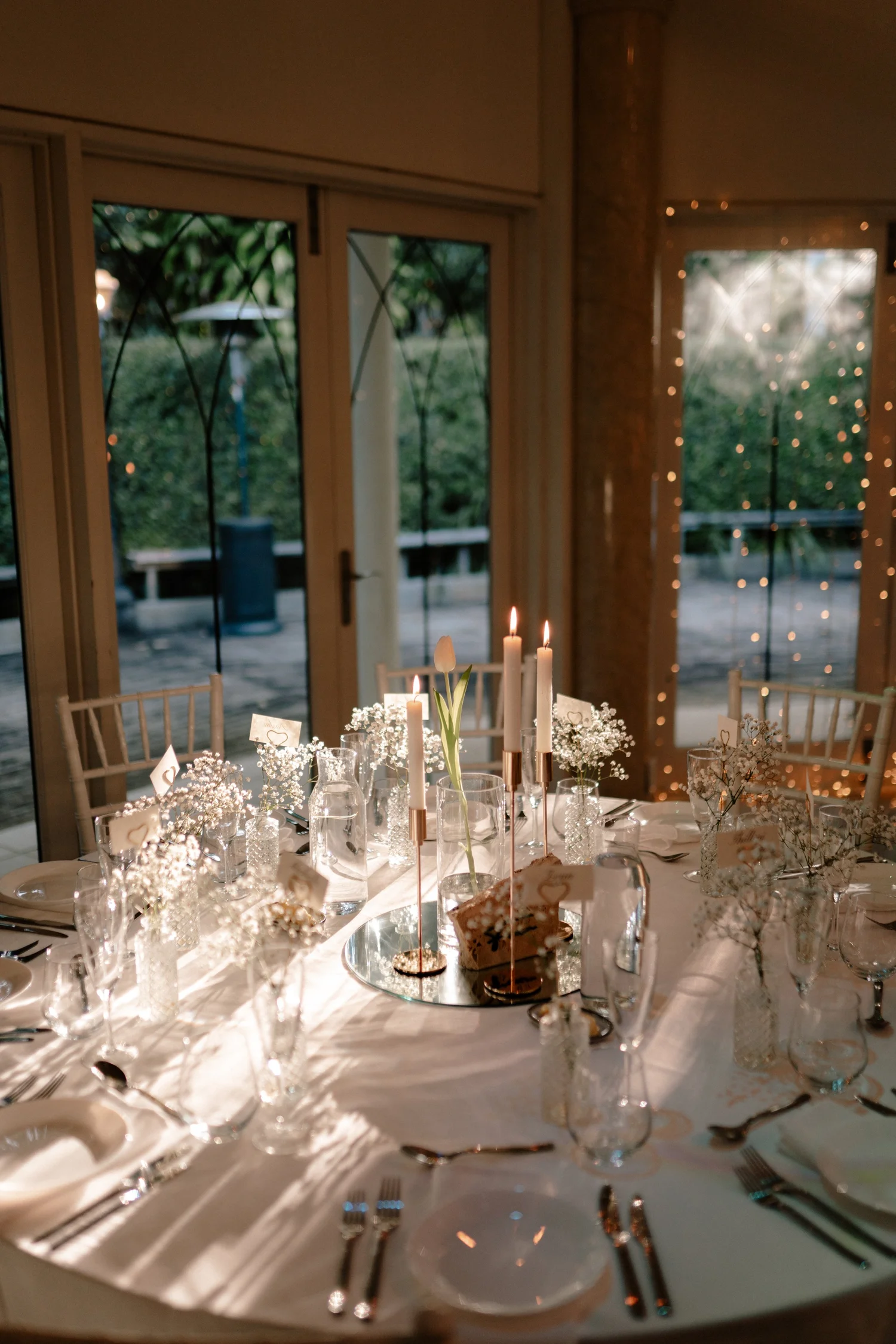 An elegant reception table prepared for a celebration at Shambala Estate.