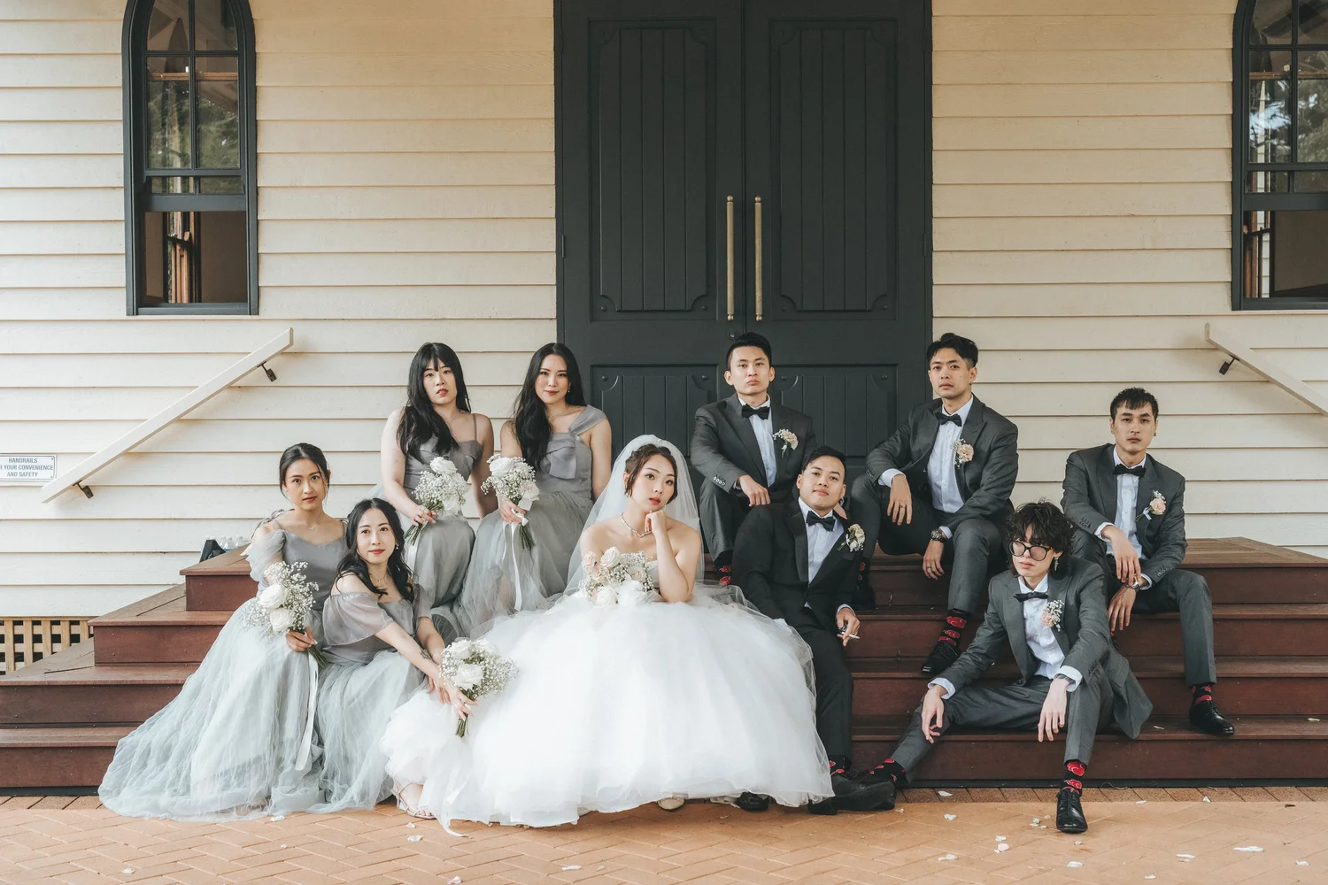 Wedding party gathered outside the Chapel at Shambala Estate.