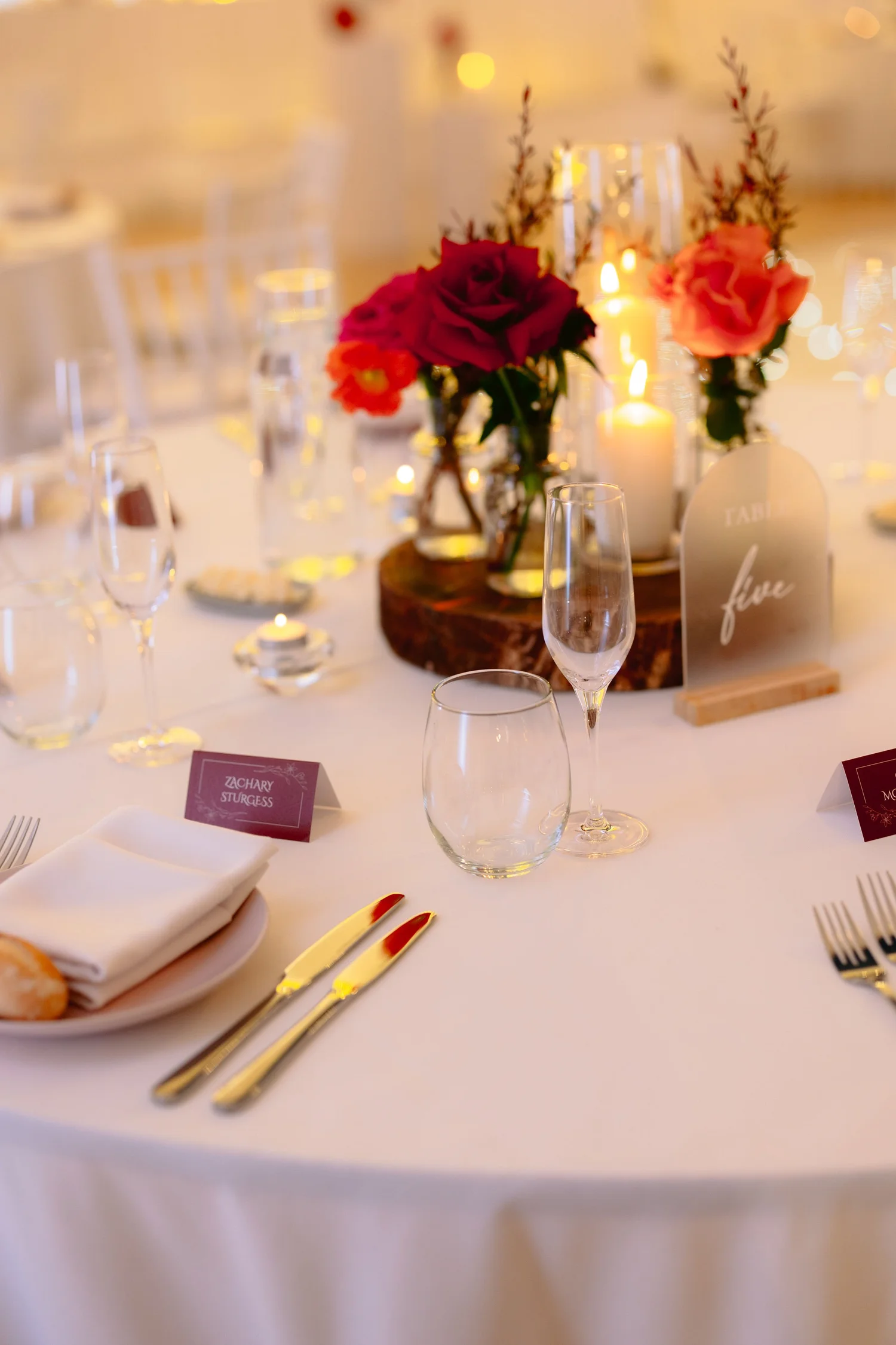 Wedding reception styling with flowers and candles at Shambala Estate