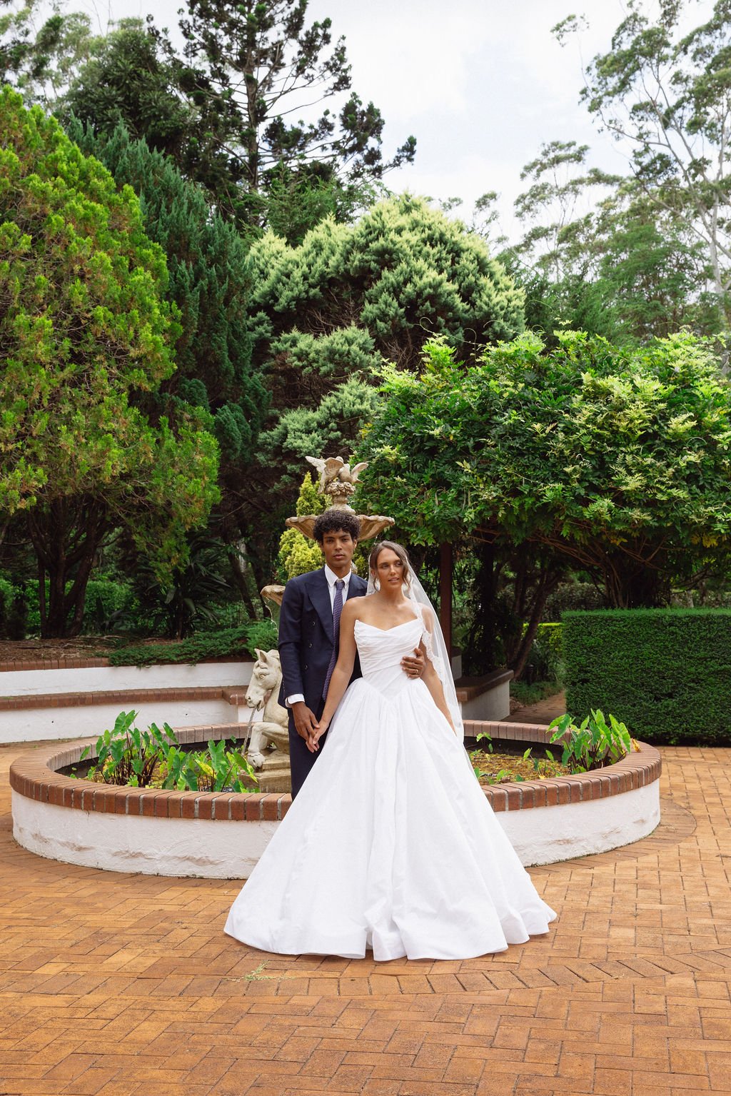 A couple together in the gardens at Shambala Estate, Tamborine Mountain