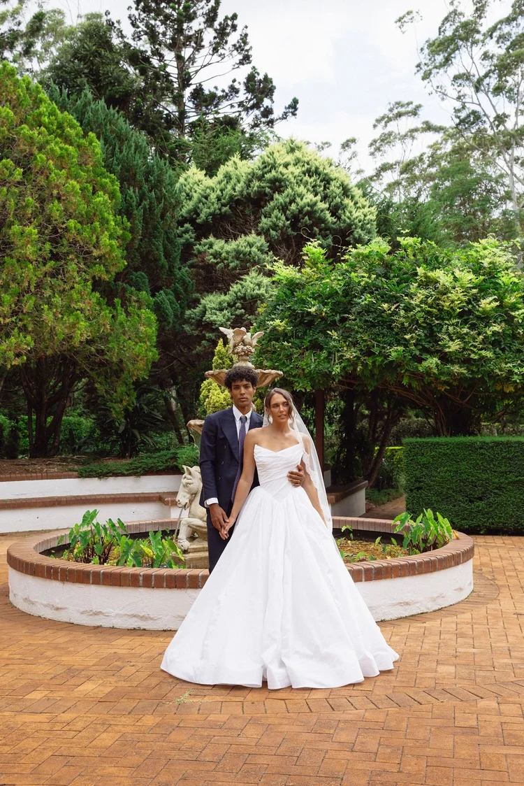 A couple together in the gardens at Shambala Estate, Tamborine Mountain