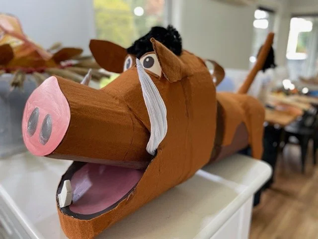 Pumba costume mask for musical theatre production of The Lion King