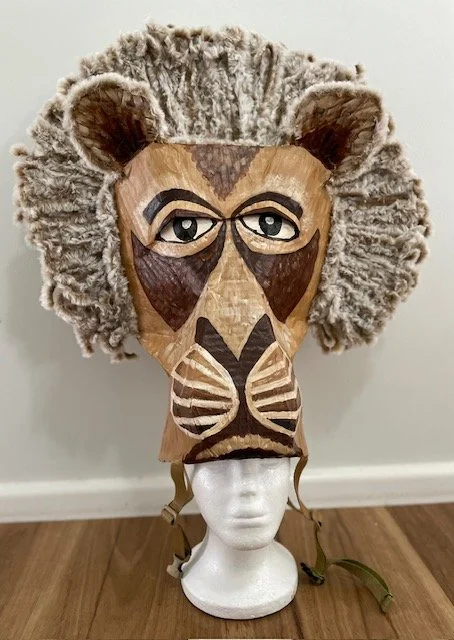 Lion costume mask for musical theatre production of The Lion King
