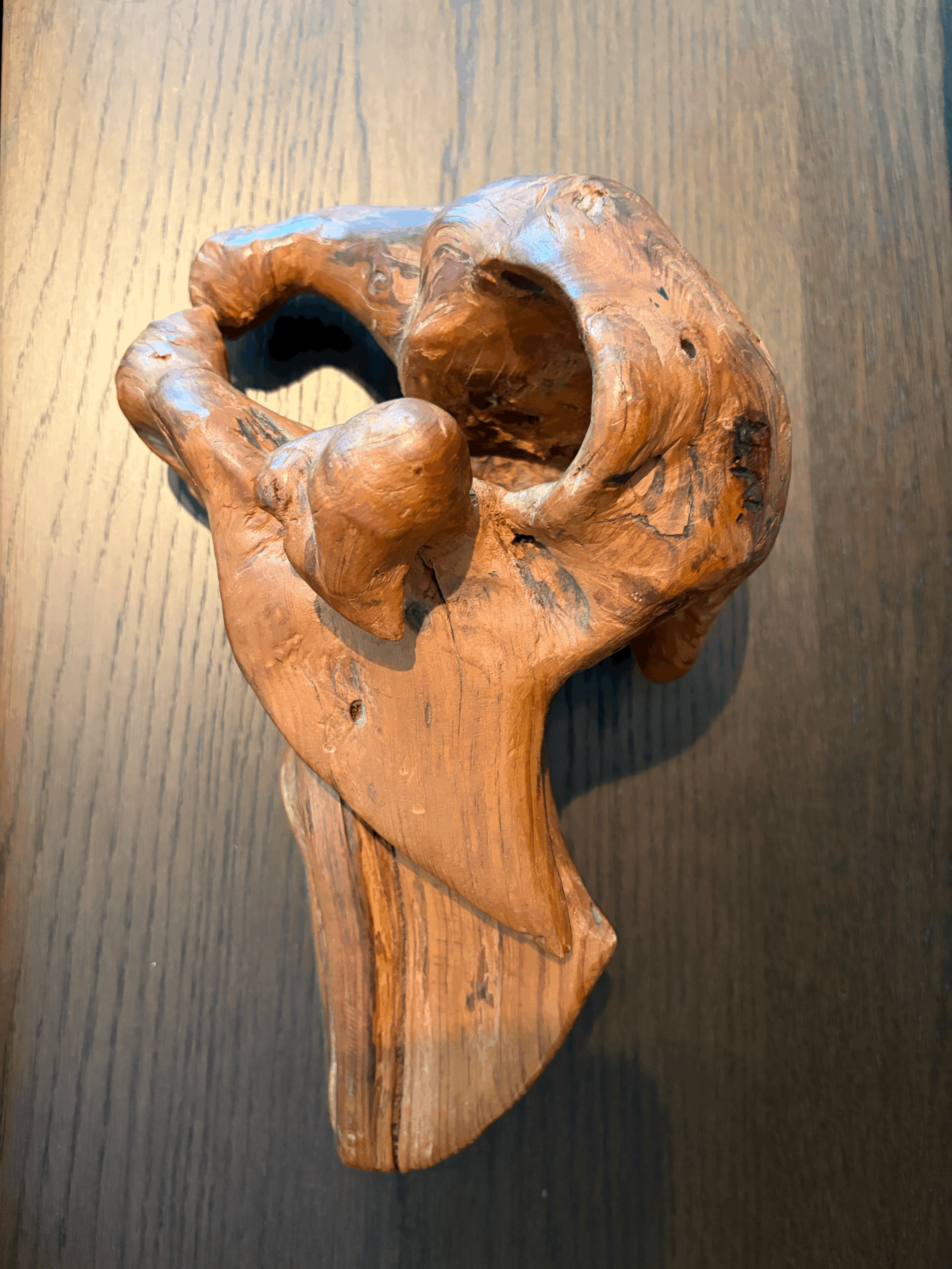 SCULPTURE, burl wood, signed with a monogram.
