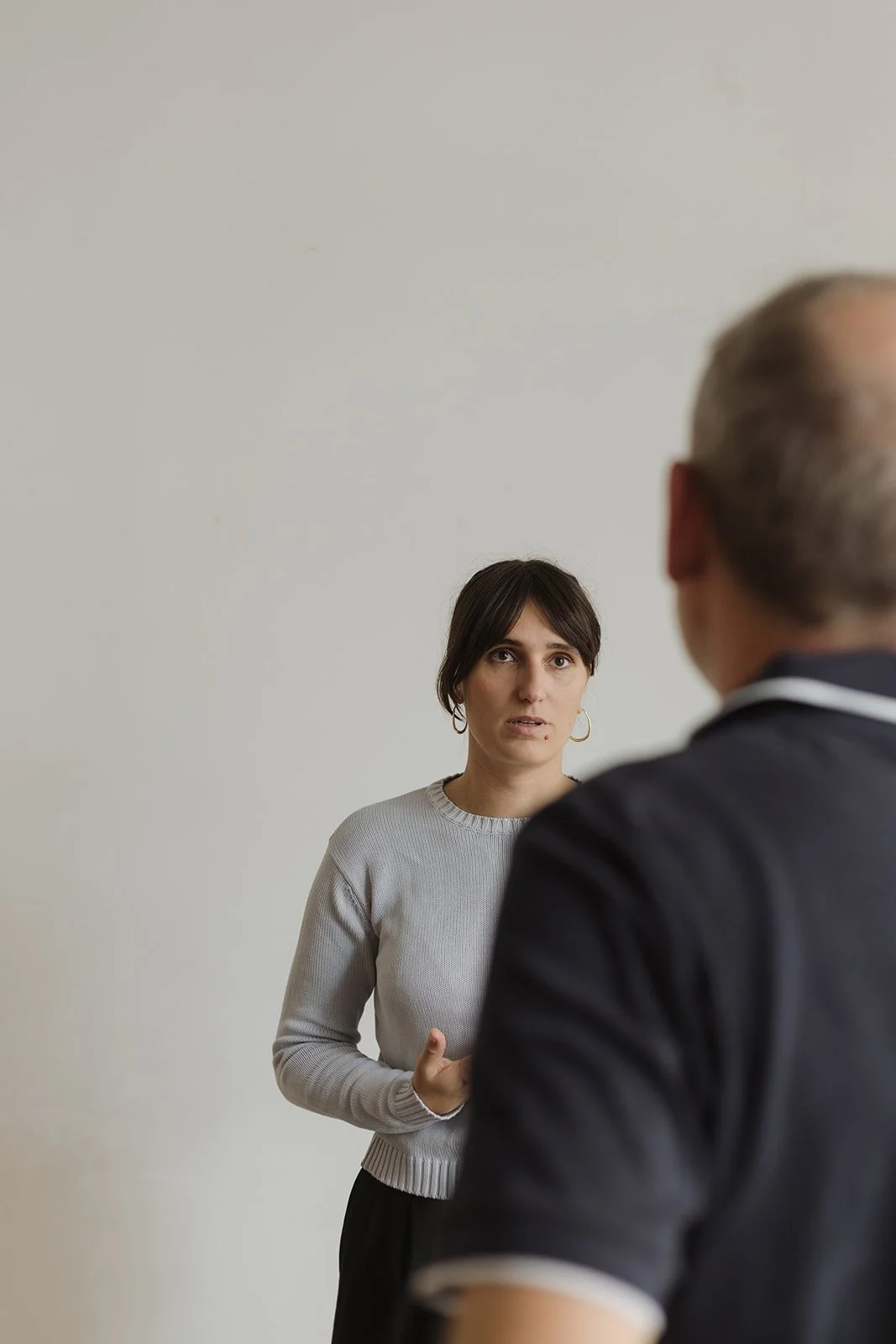 chiropractor talking to a patient