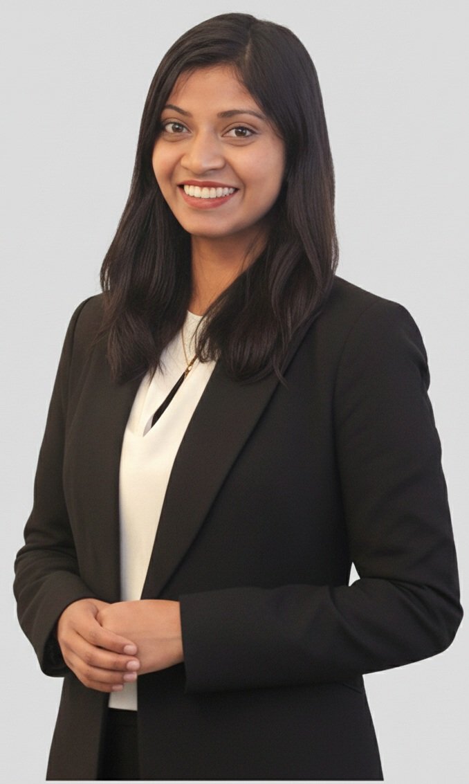 Gayani Jayasekera, Queensland property and conveyancing solicitor, smiling in professional portrait.