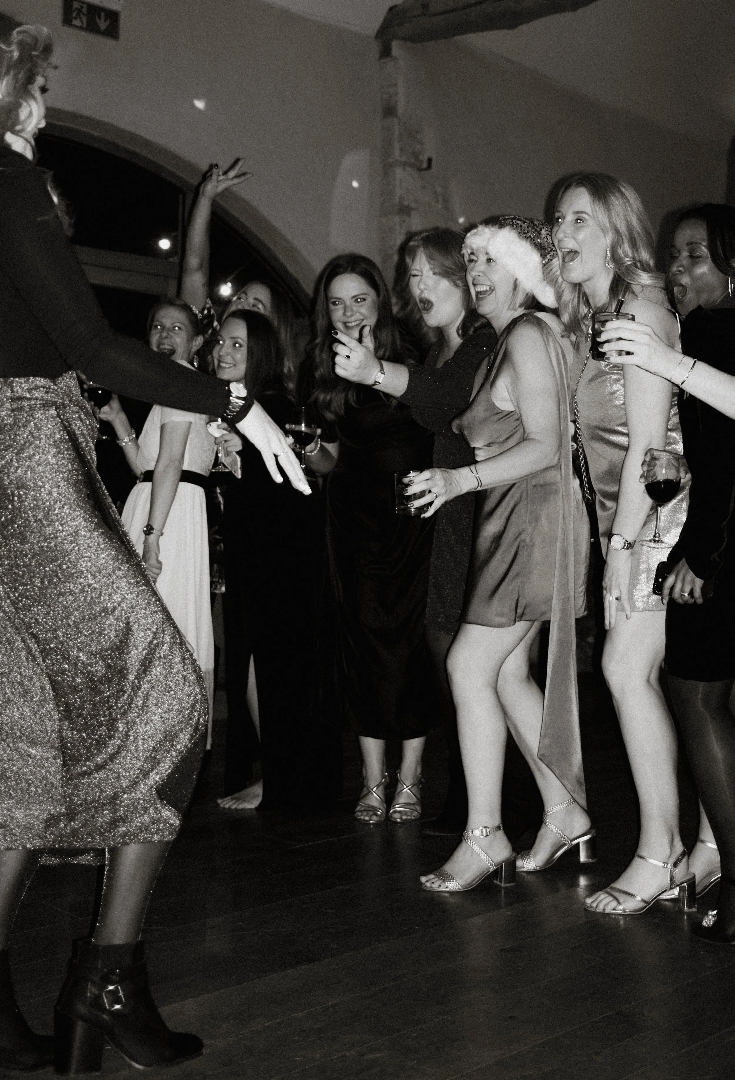 Guests celebrating at a Christmas party at Oxleaze Barn