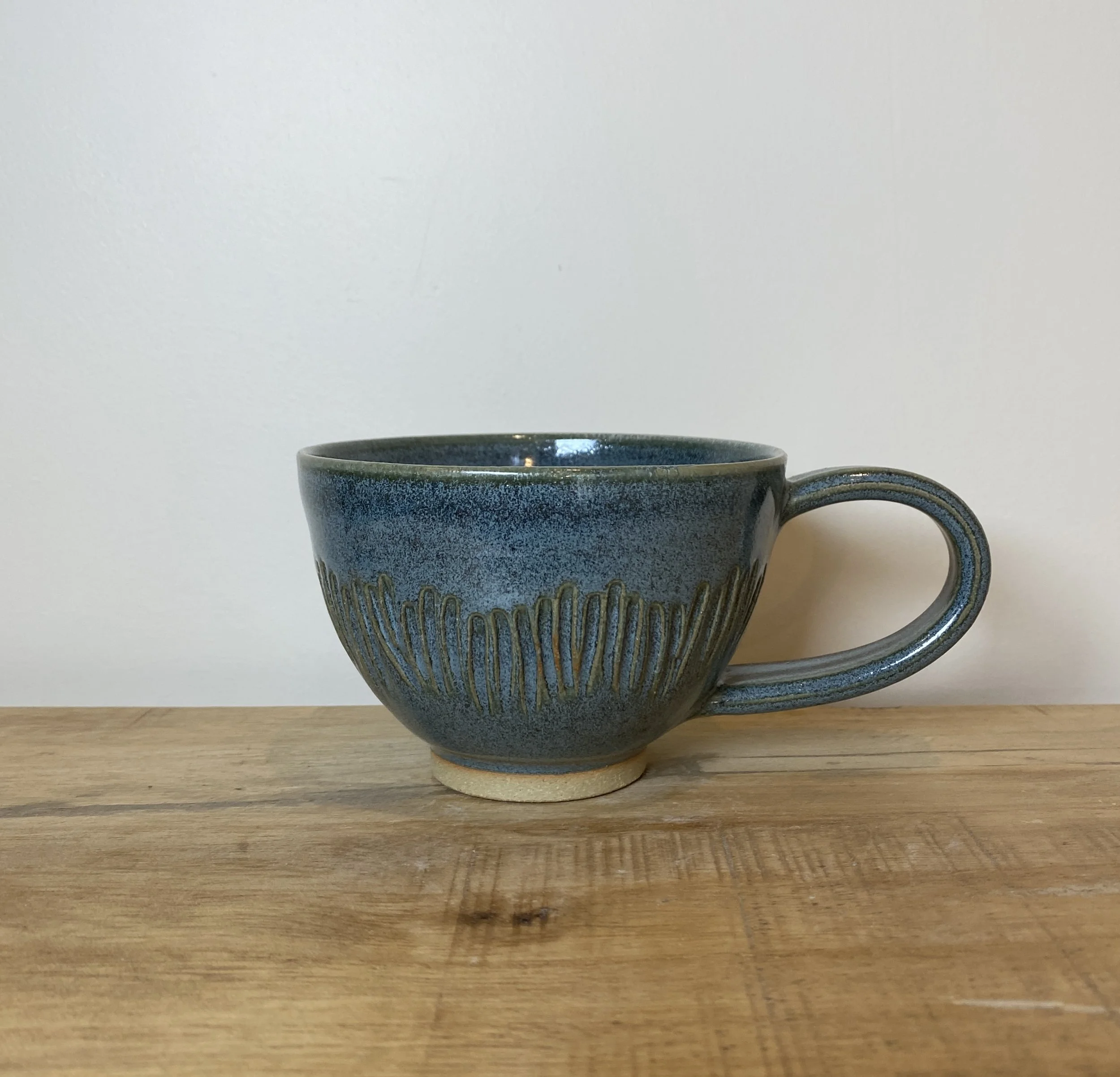 Green cappuccino cup