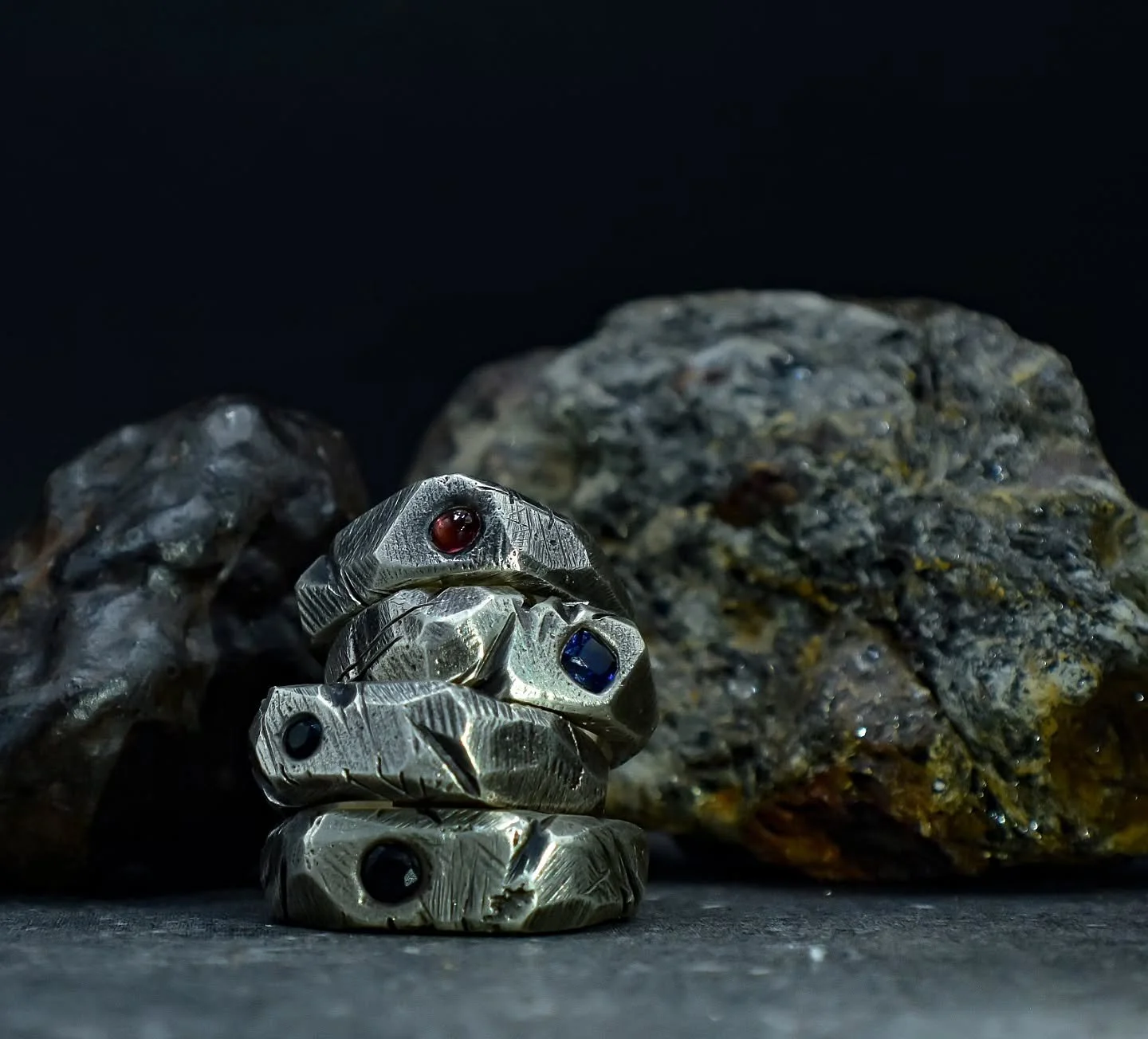 The Kaos series.
This is a new design I've been putting together, based on spontaneous and erratic shaping, mixed with precision cut sapphires.

My vision for this series is to create a balance between frantic, anxious energy, and quiet, bold design.