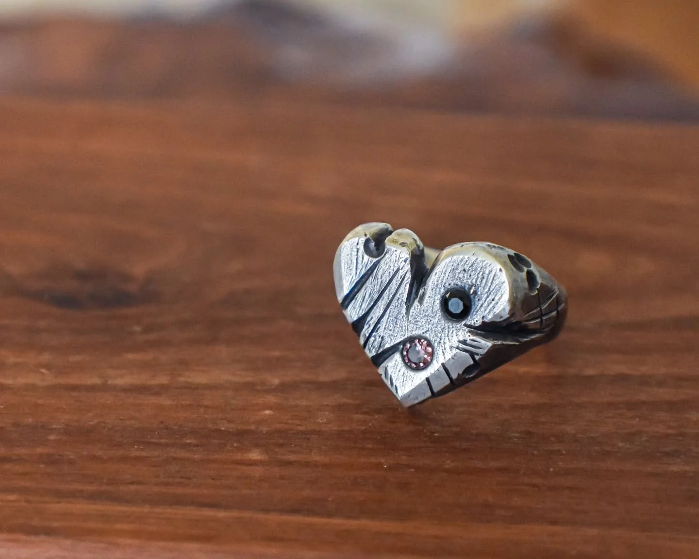 Swipe to see how this Kaos heart signet turned from a lump of wax, into an epic silver ring!

This was a custom order request, after my client saw some heart rings with stones set in them. The brief was basically, "a love heart ring. But done in