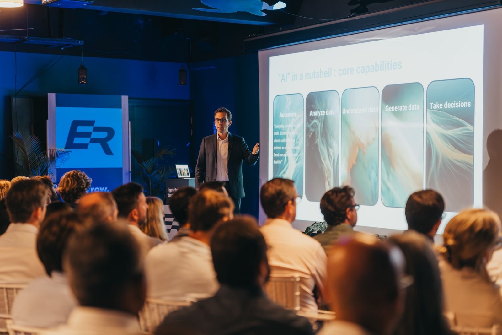 Eqxia AI keynote presentation at a corporate event in Mauritius with live generative AI demonstrations and audience engagement