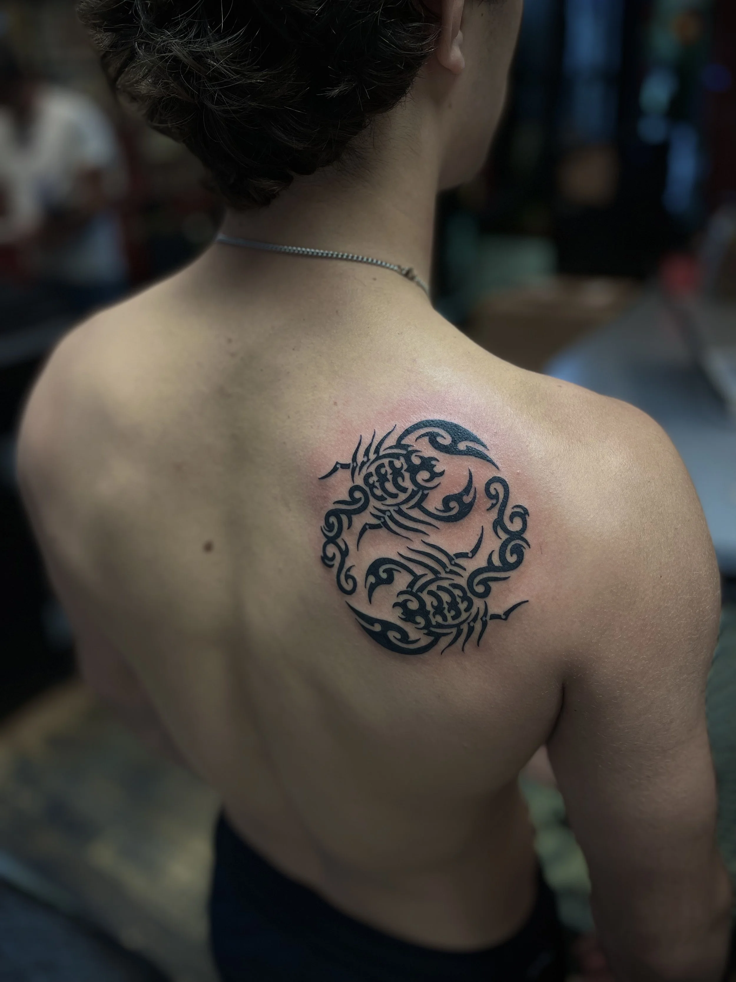 Tribal scorpion tattoo, done at Frith Street Tattoos, Soho, central London.
