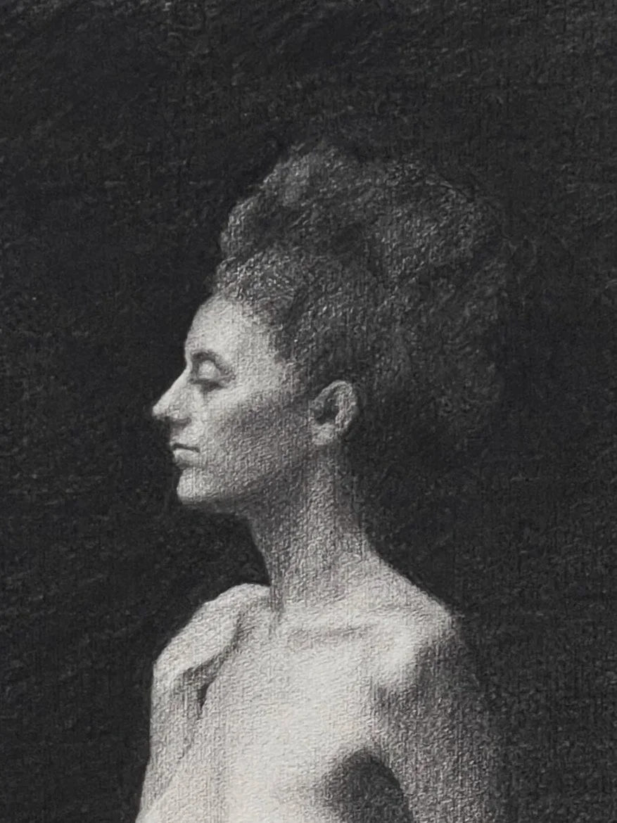 Charcoal drawing of a female figure 