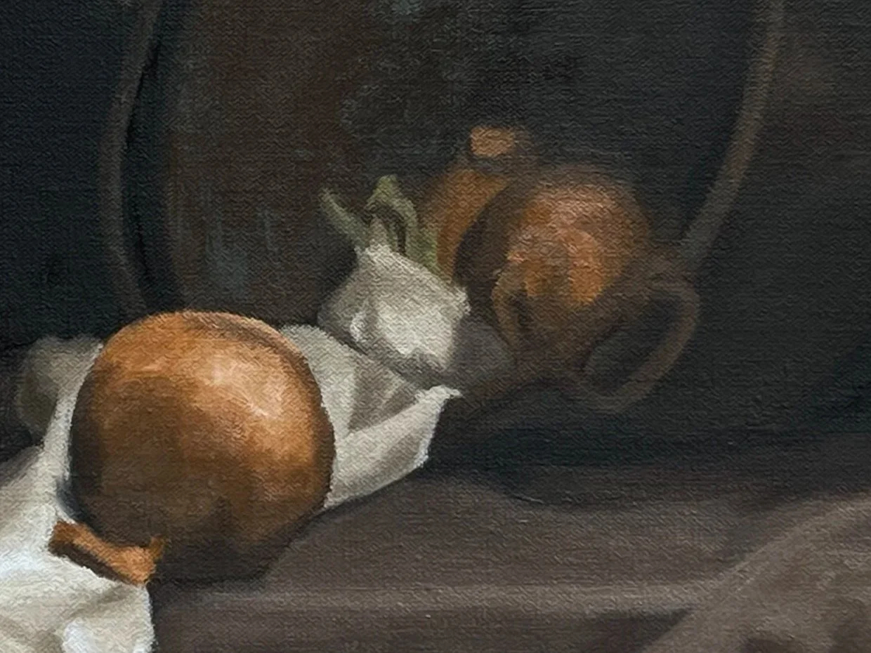 Still life oil painting of onions, garlic, drapery and a copper pot.