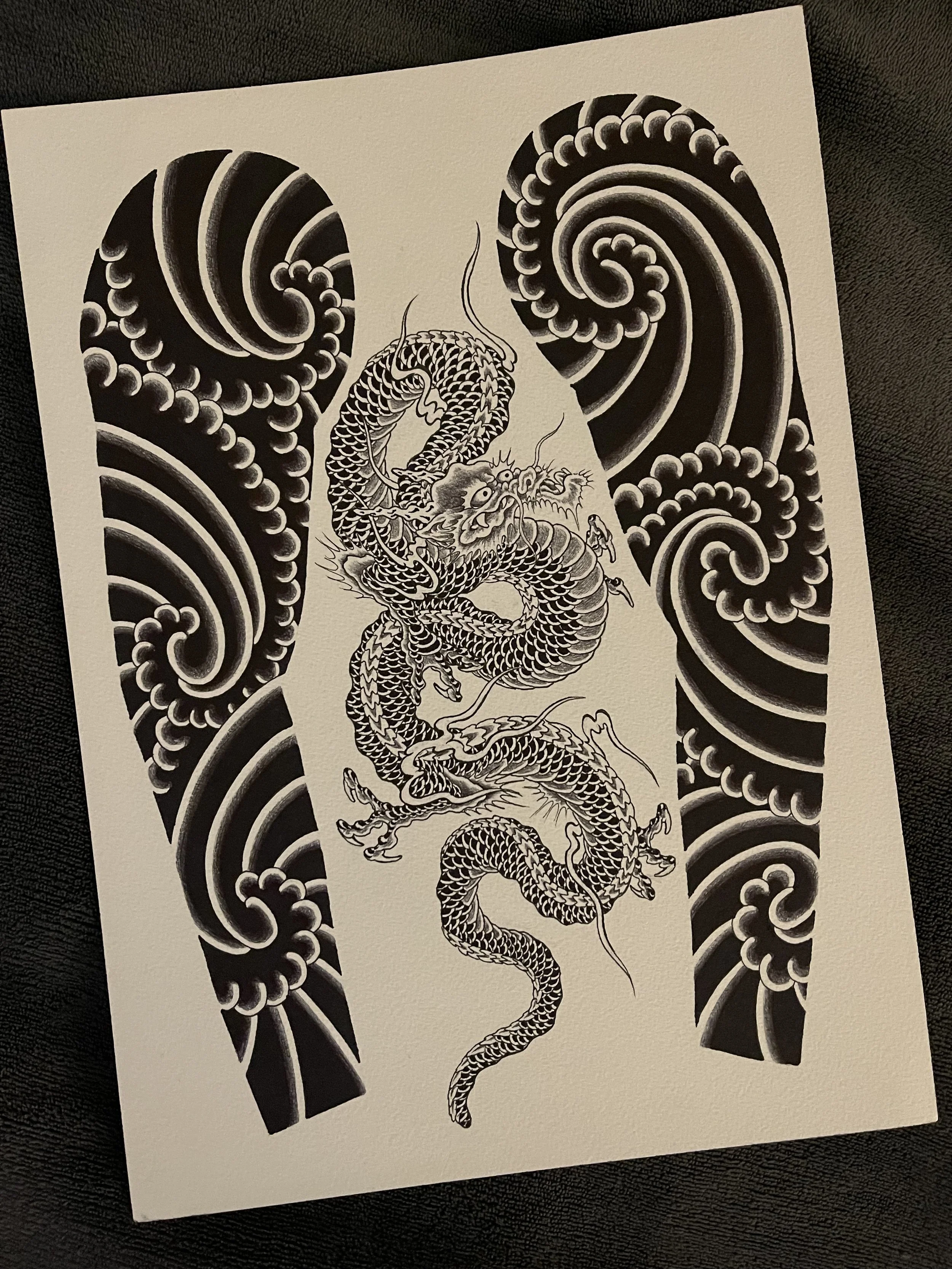 japanese sleeves of clouds windbars and dragon tattoo design.jpg