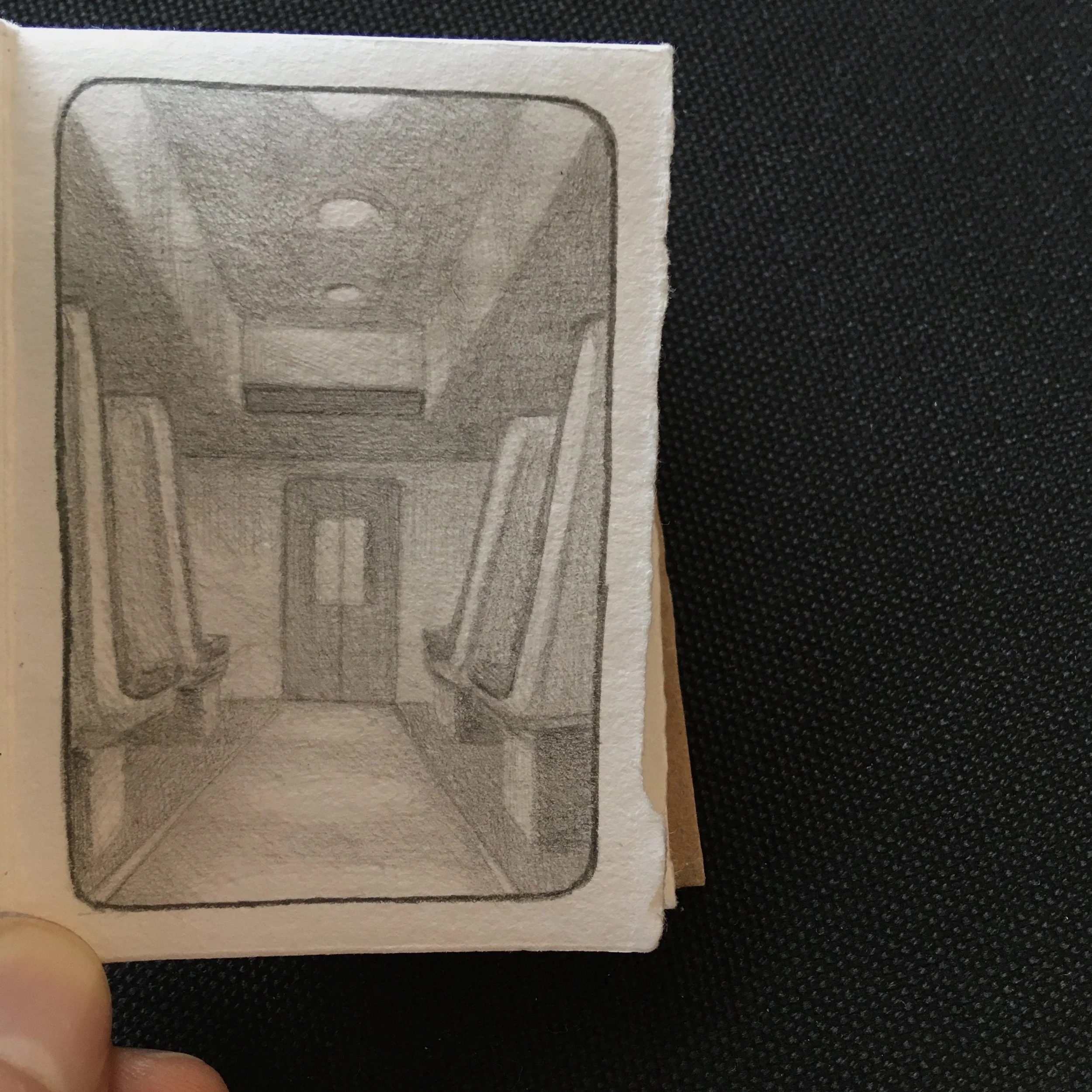 Pencil on paper illustrated short story of a train ride from Falmouth to London in the 2021 lockdown.