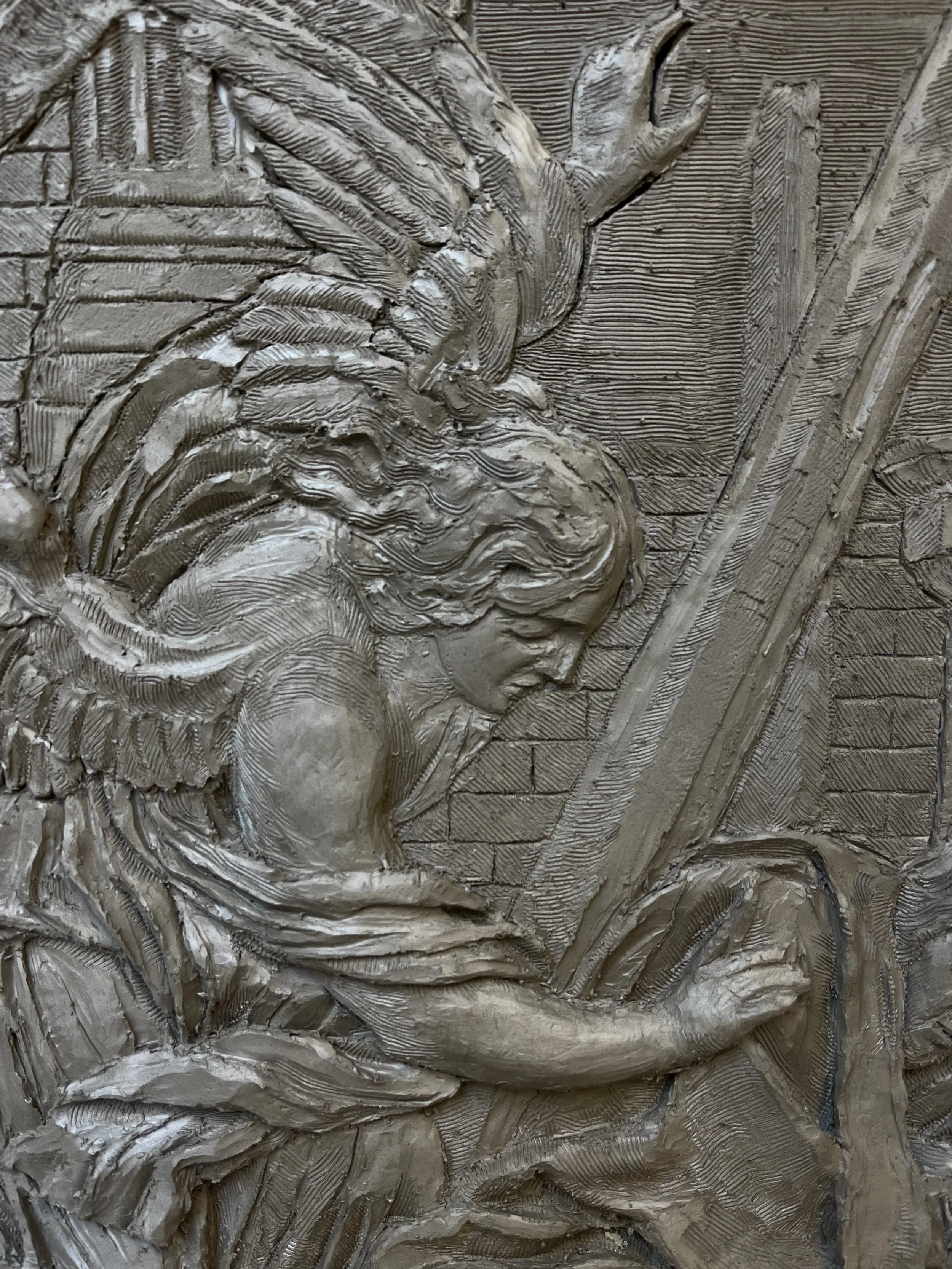 Clay model for scaled up relief carving.
