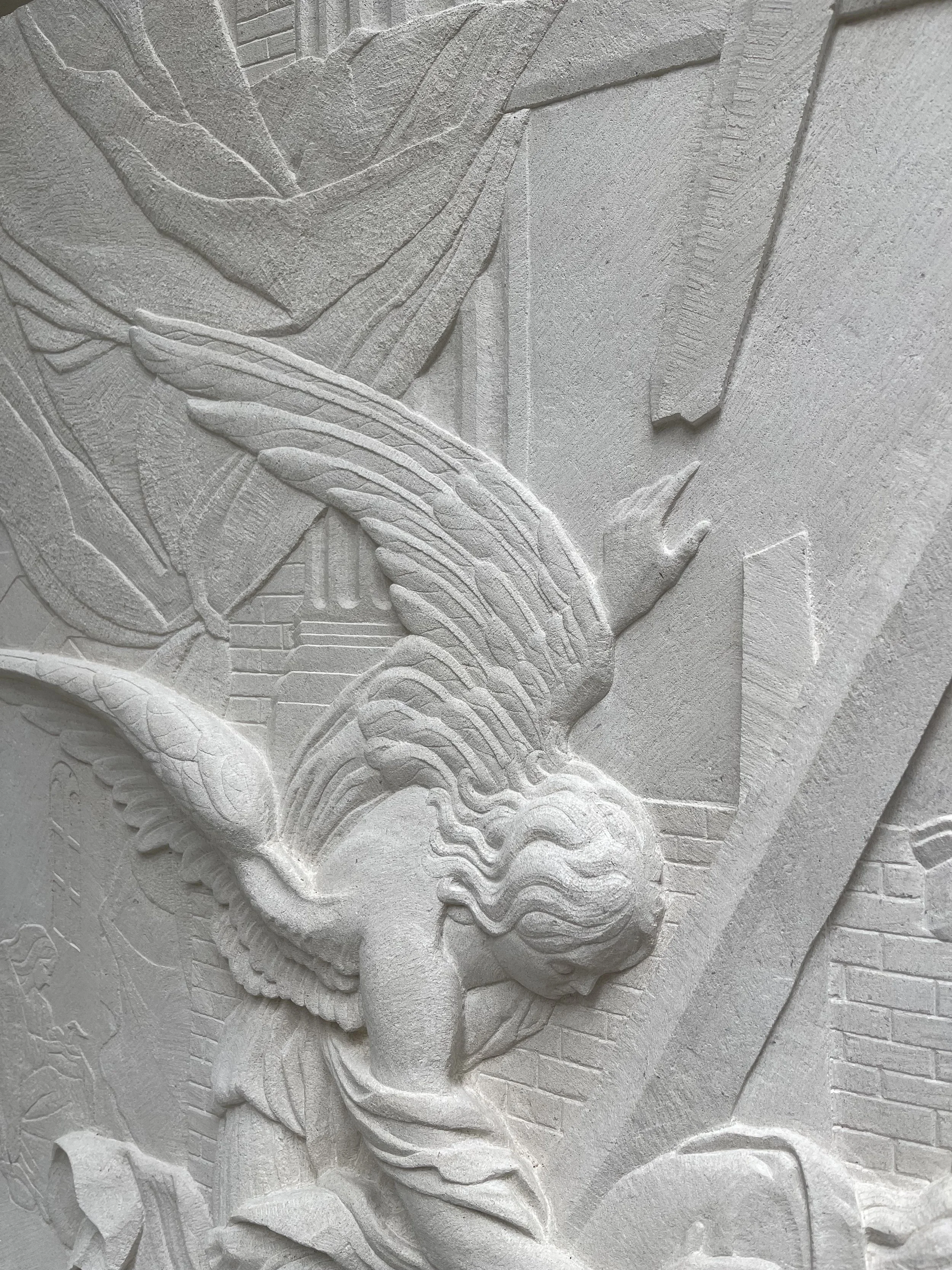 Stone carving in relief of Simon Vouet's 'Dream of Saint Joseph', in Portland stone.