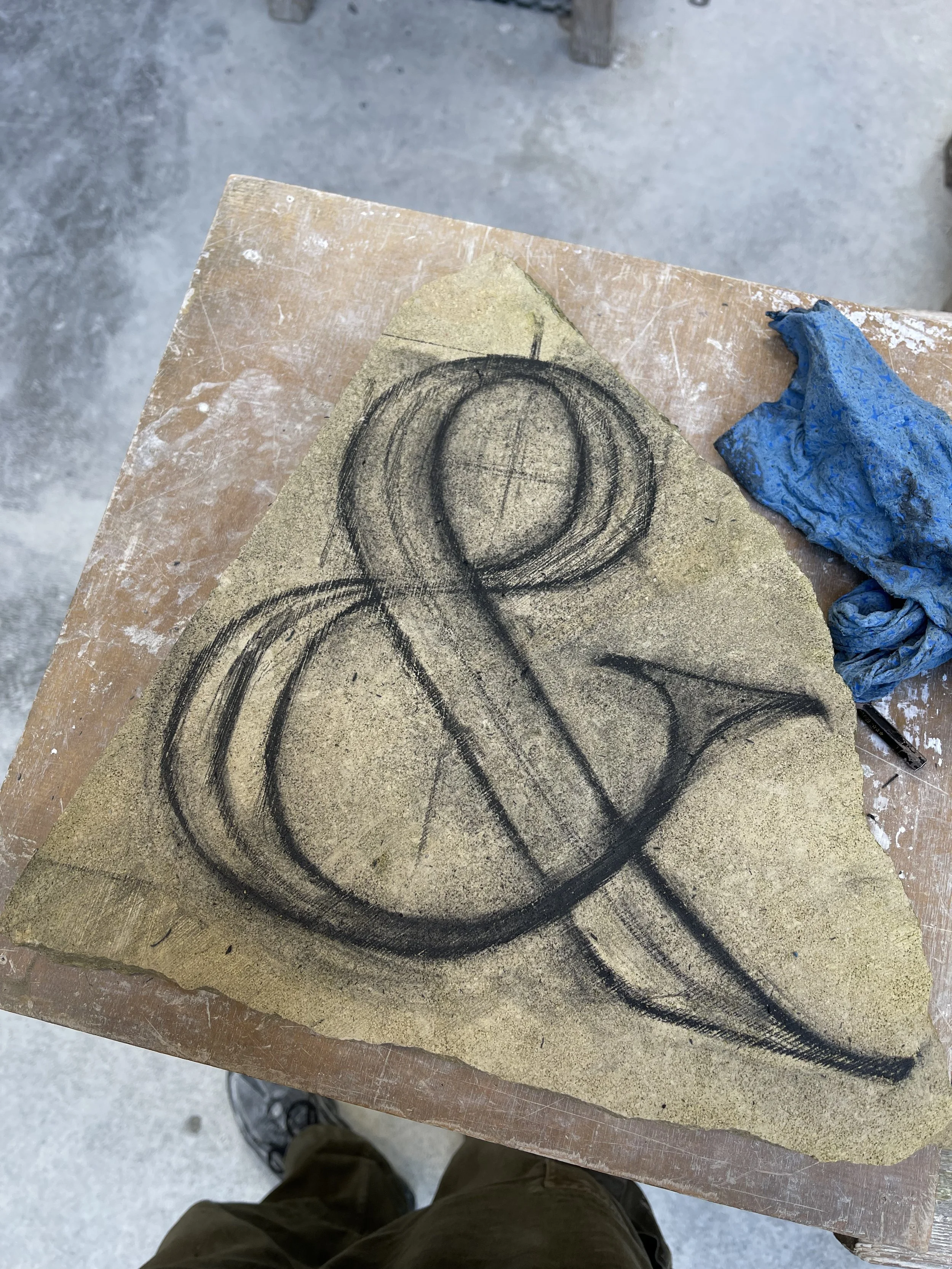 Drawing in charcoal pencil for a stone carving of an ampersand, in Caen limestone.