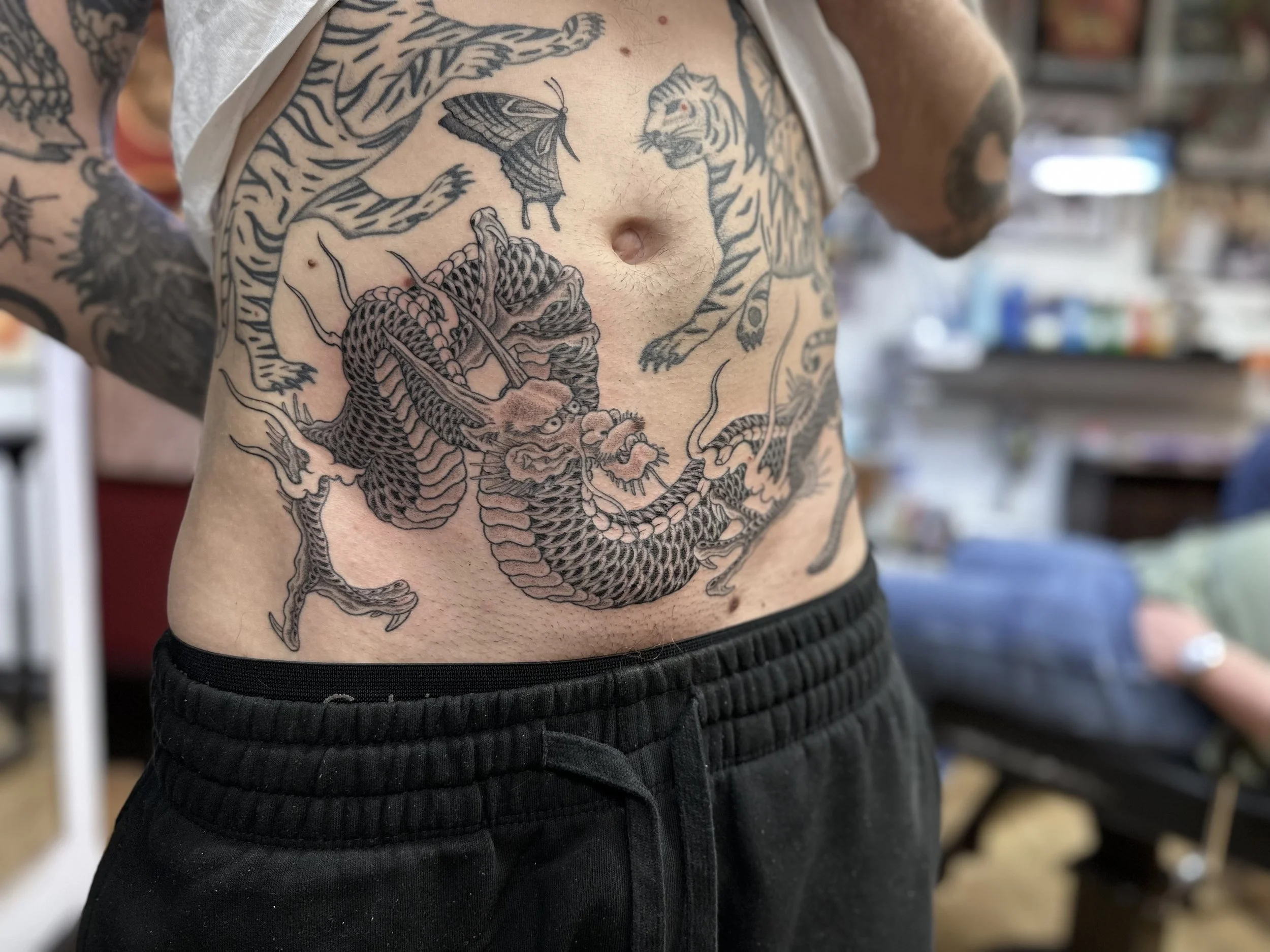 Fine line Japanese dragon tattoo, done at Frith Street Tattoos, soho, central London.