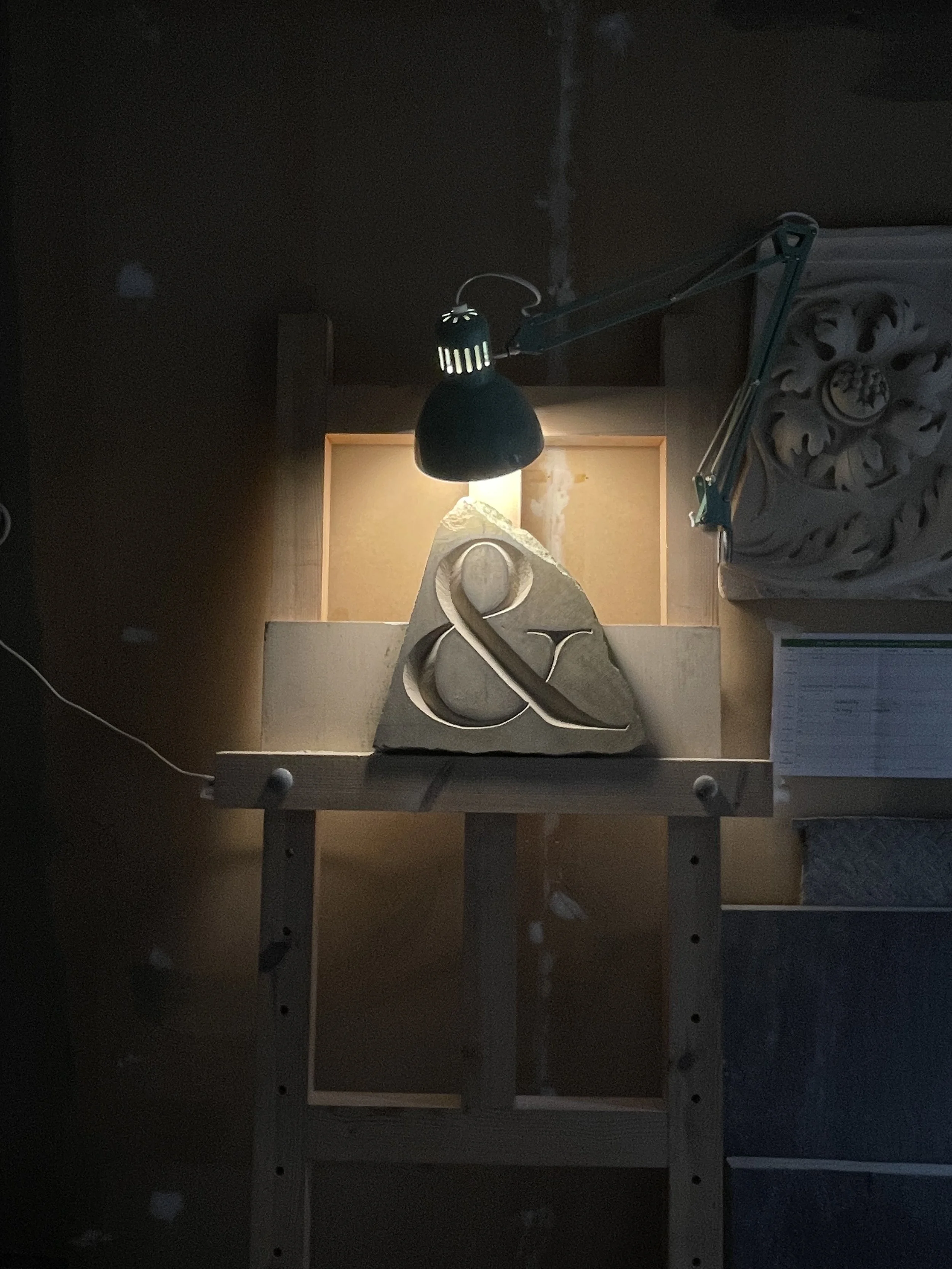 Stone carving of an ampersand in Caen limestone.