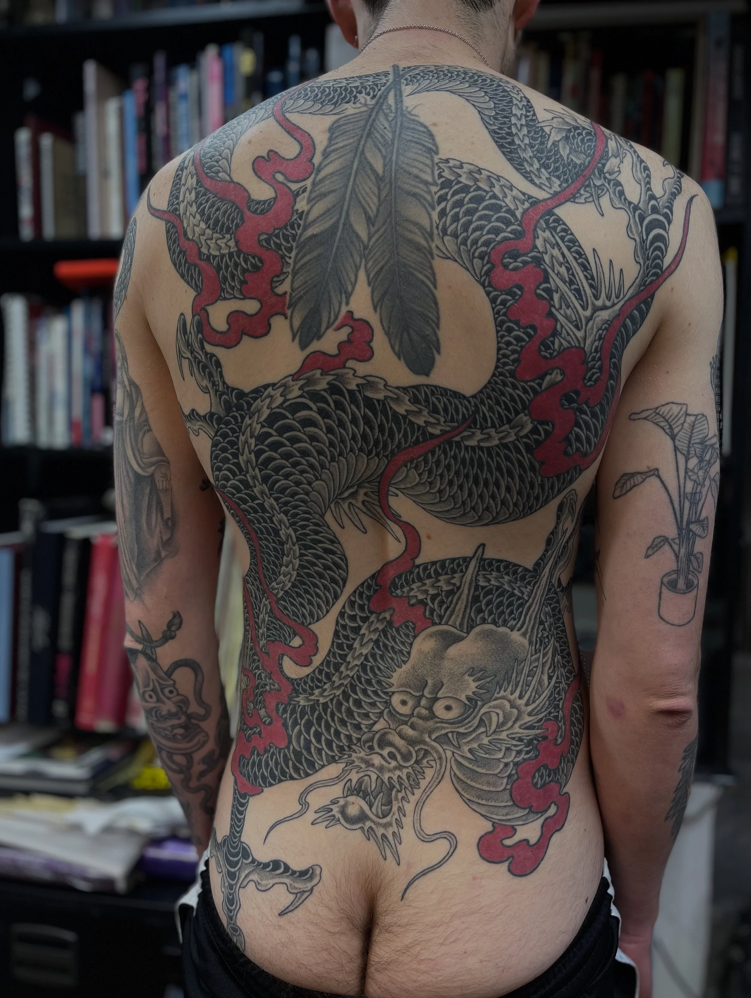 Fine line Japanese style dragon backpiece done at Frith Street Tattoos, Soho, central London.