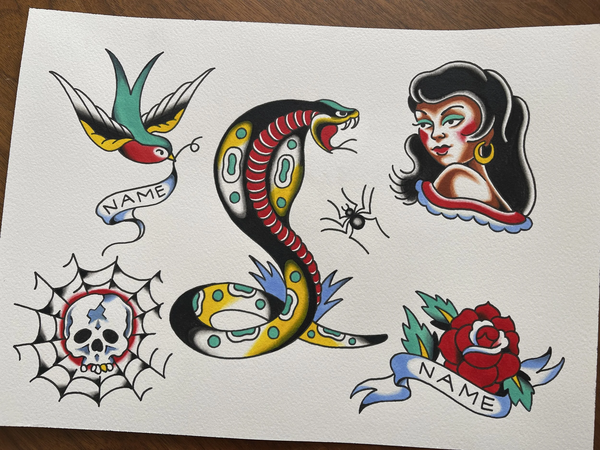 Traditional tattoo flash sheet of cobra, spider, girl, skull and web, swallow, rose and banners, designs available to be tattooed at Frith Street Tattoos, Soho, London