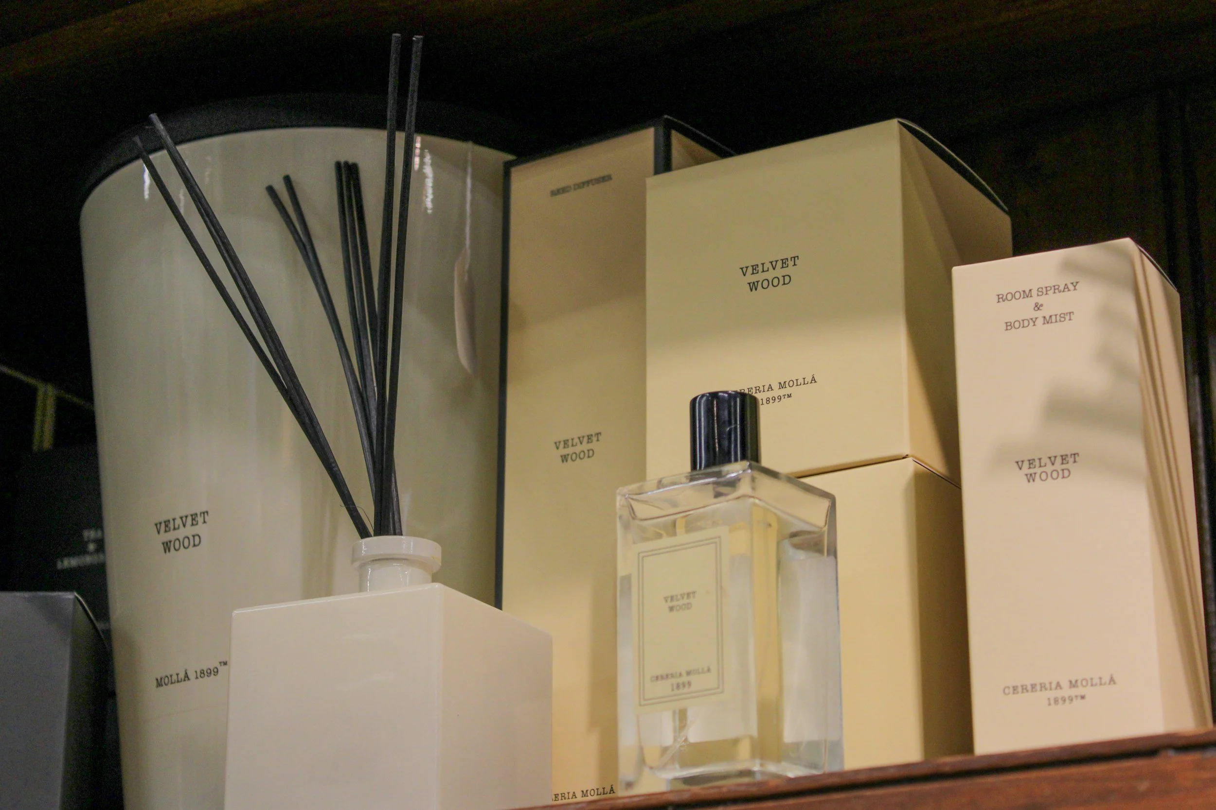 An image of a fragrance bottle, a box containing fragrance and a scent duffuser - all non-branded but in support of a case study from Jo Malone London