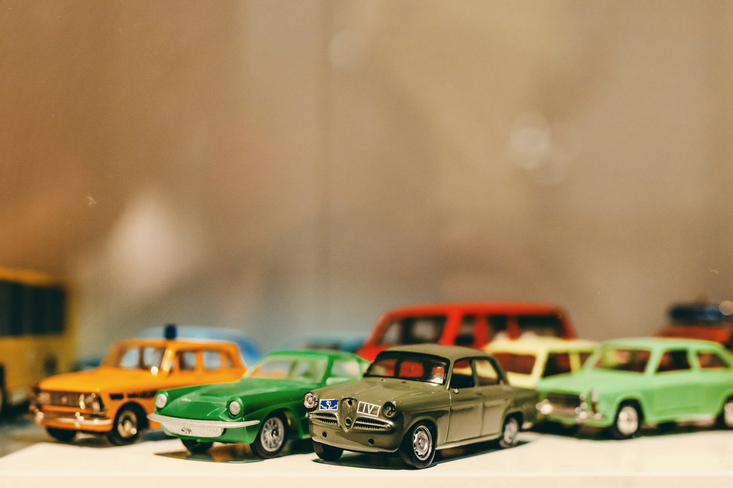 A modern image of toy cars from the 1950's used to describe a case study about MINI in the UK