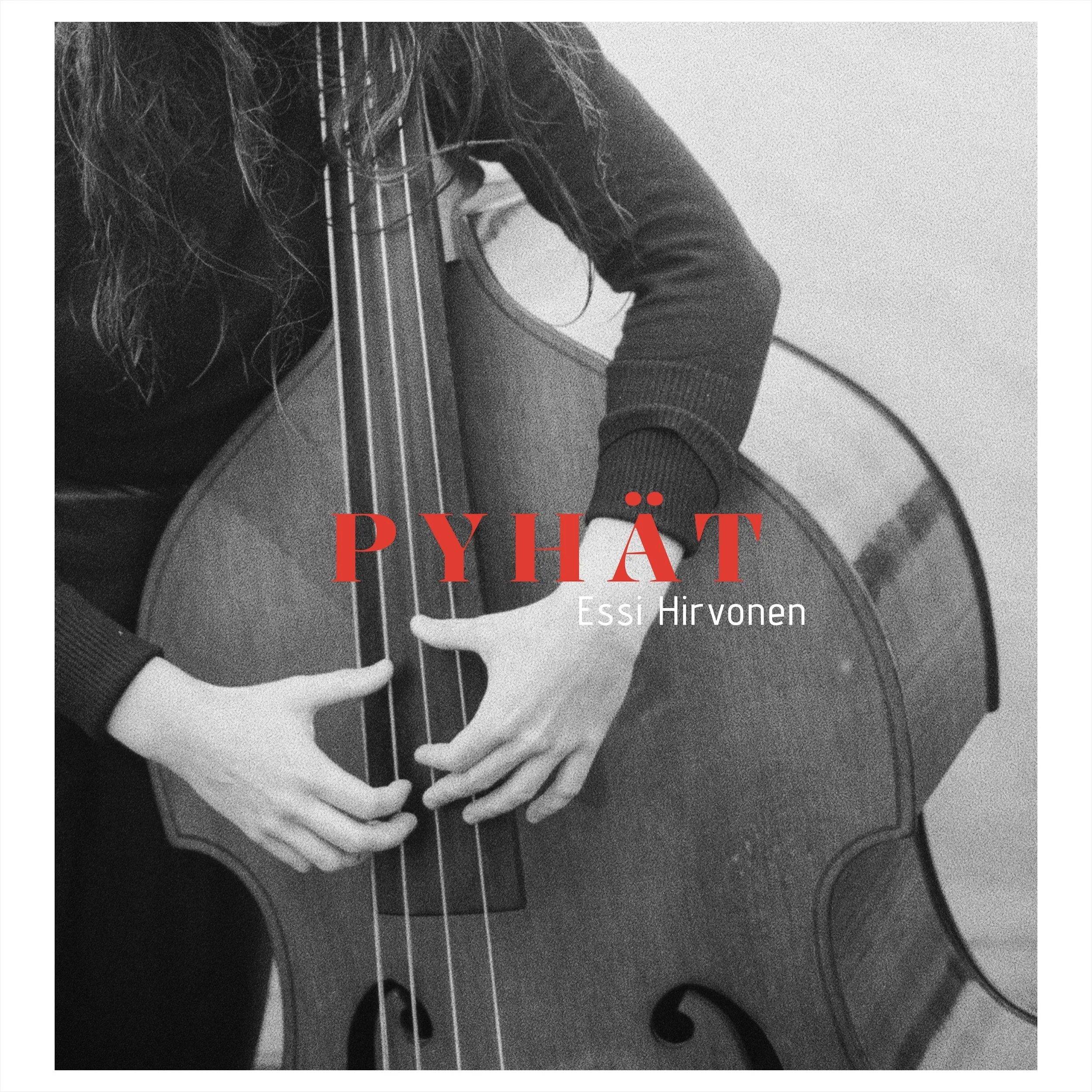 Black and white photo of a person playing a double bass, with a focus on their hands on the instrument.