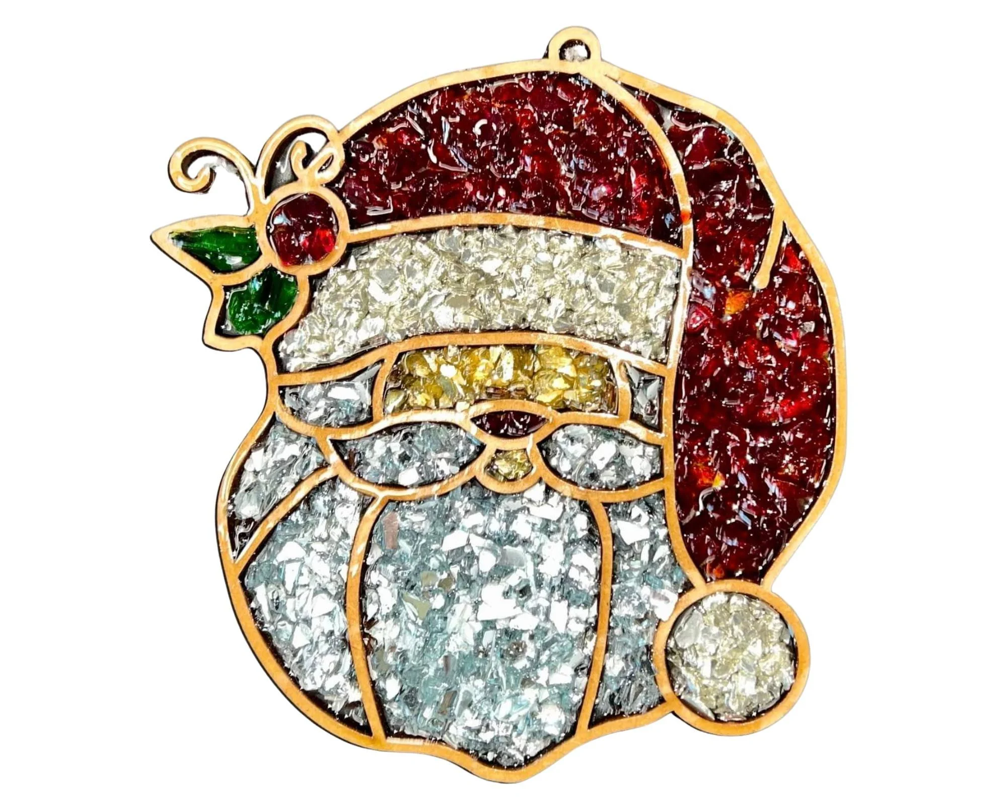 Decorative stained glass ornament of Santa Claus with a red hat, white beard, and holly leaves, outlined in gold.