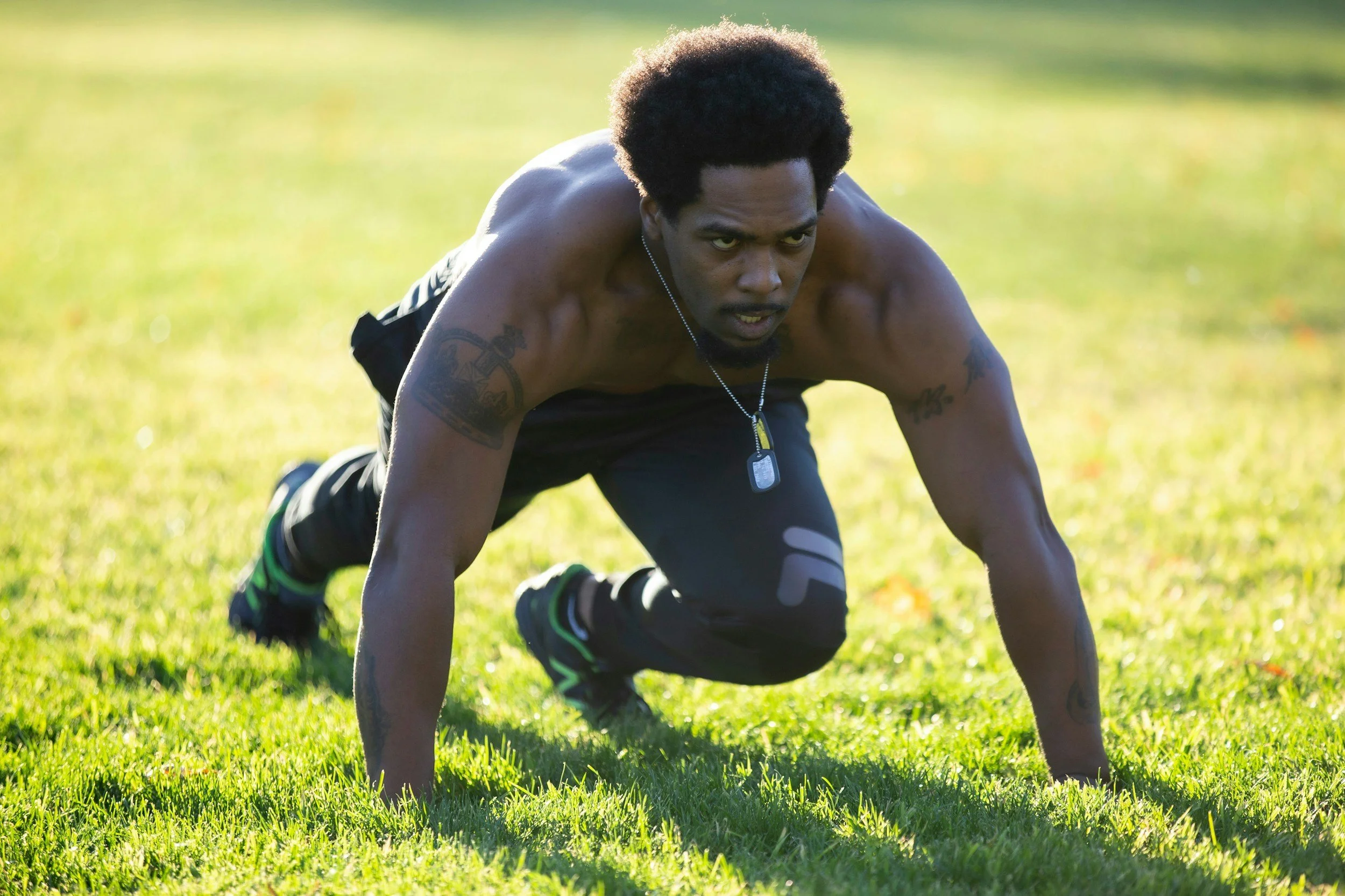 Man performing mountain climbers exercise