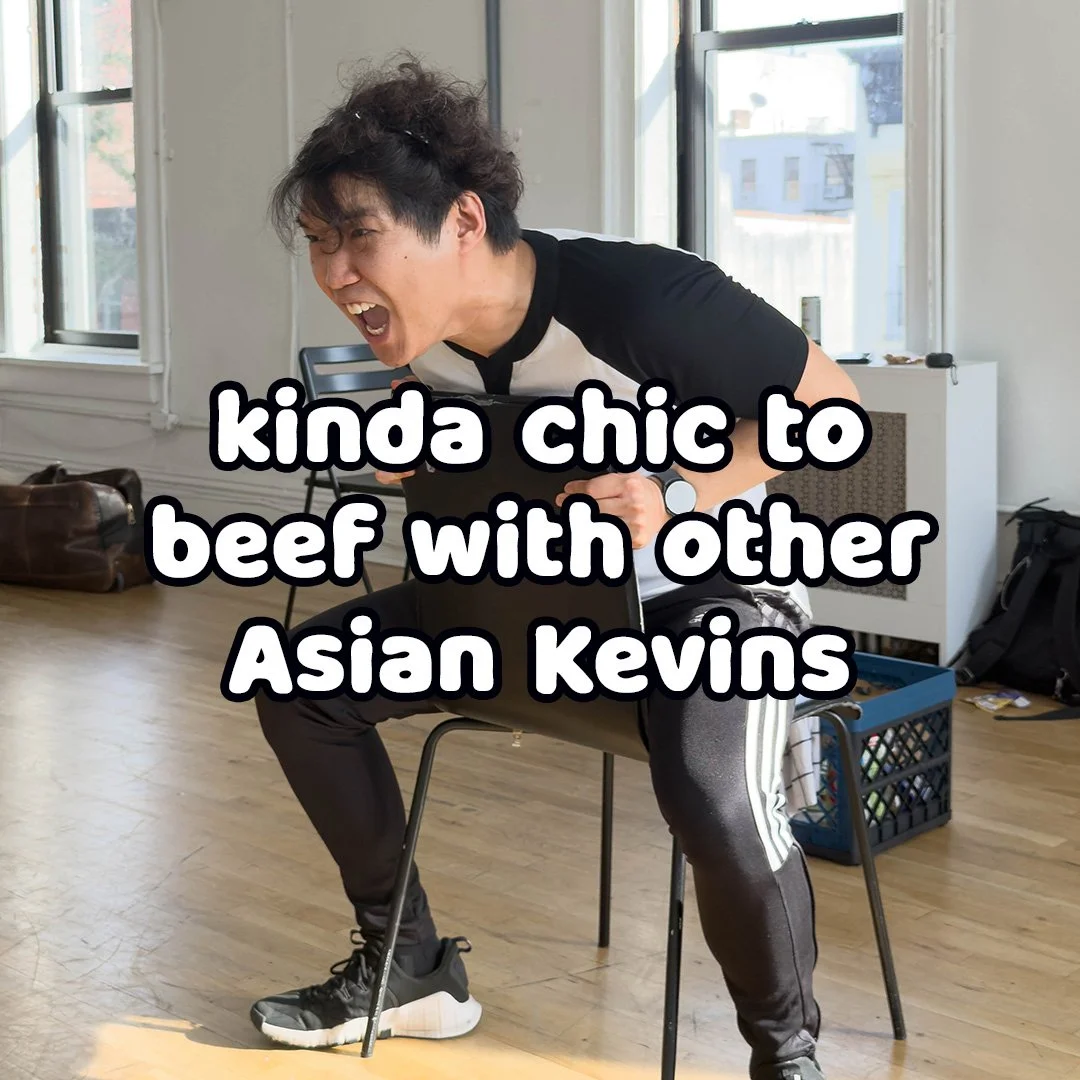 A young Asian man with curly hair smiling and leaning forward while seated on a black chair, with text overlay that reads 'kinda chic to beef with other Asian Kevins'.