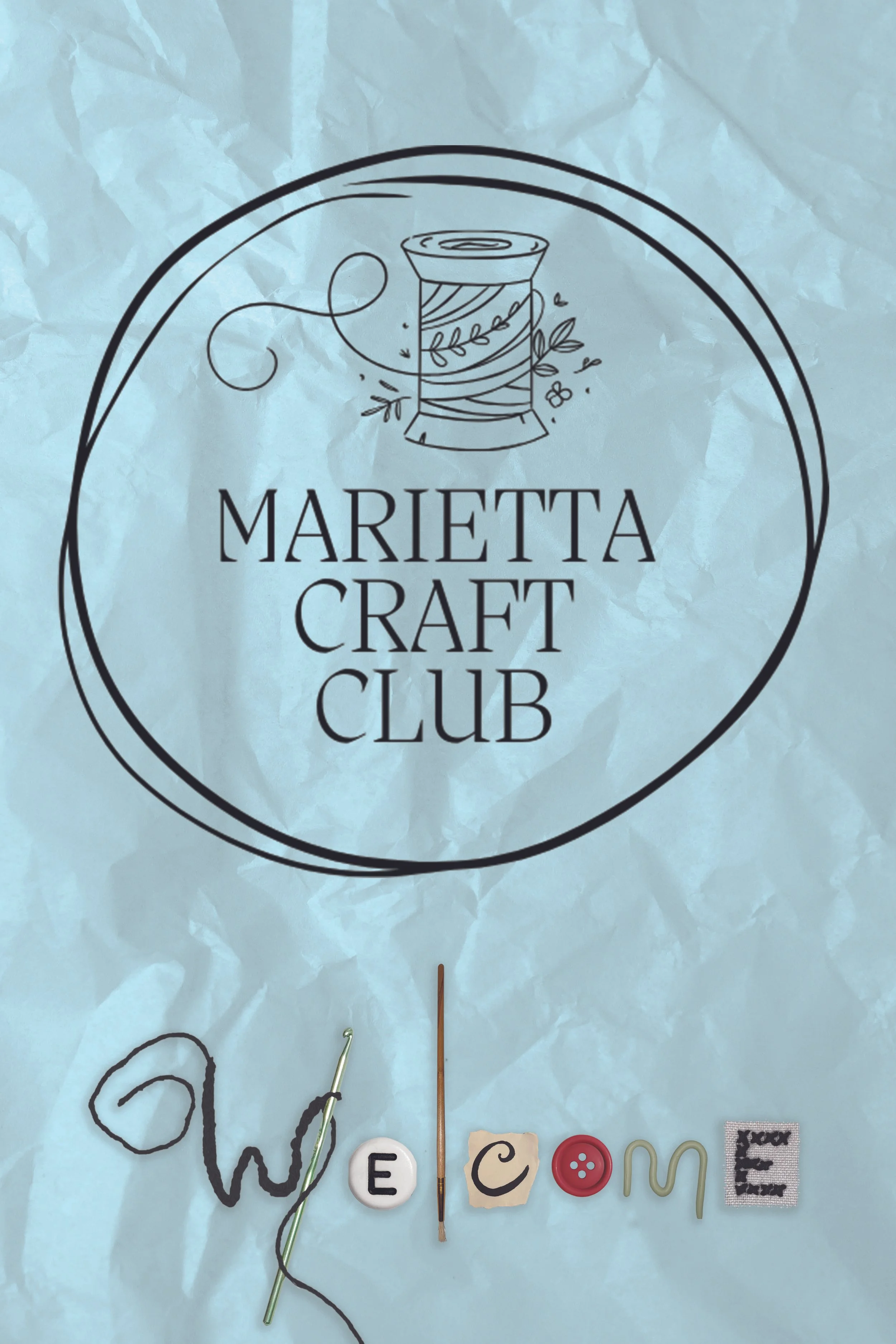 Craft supplies on crumpled light blue paper background, including embroidered piece, pins, beads, and buttons spelling 'welcome' with a spool of thread and embroidery floss logo at the top.