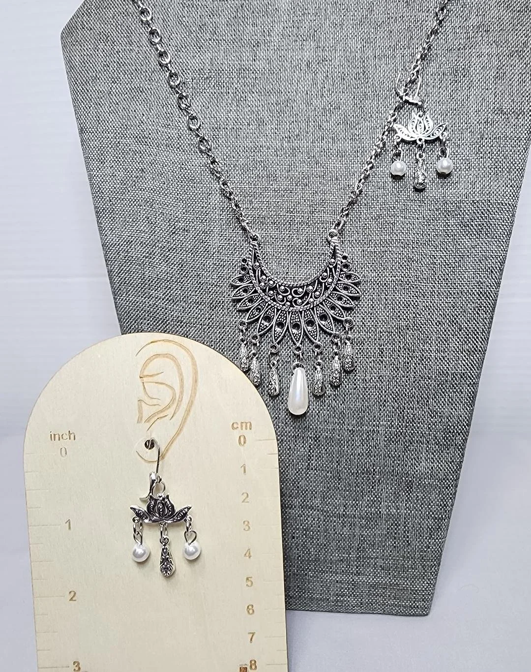 S statement silver necklace and ear.jpg