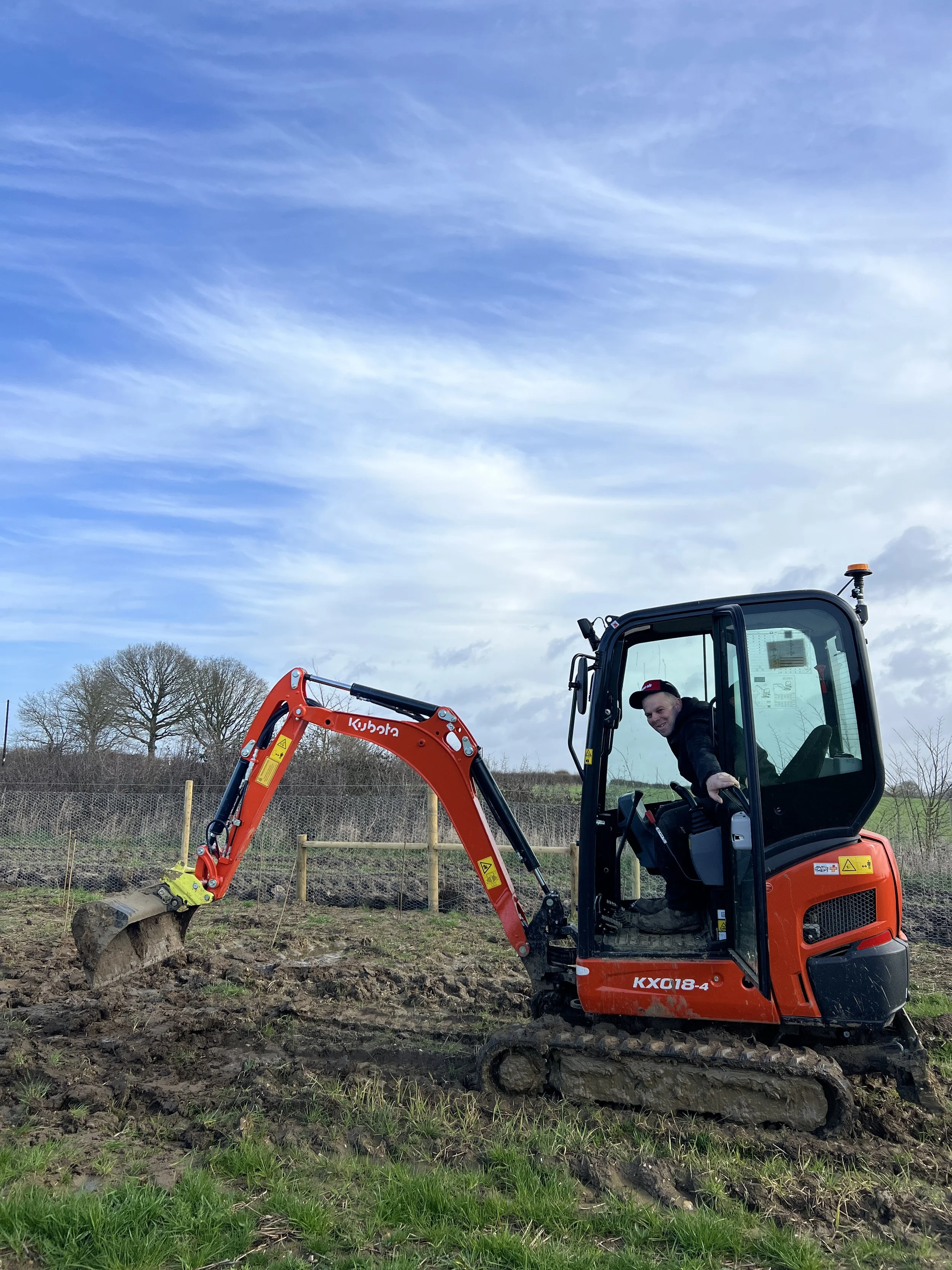 Our new Kubota helped to dig trenches for the fencing
