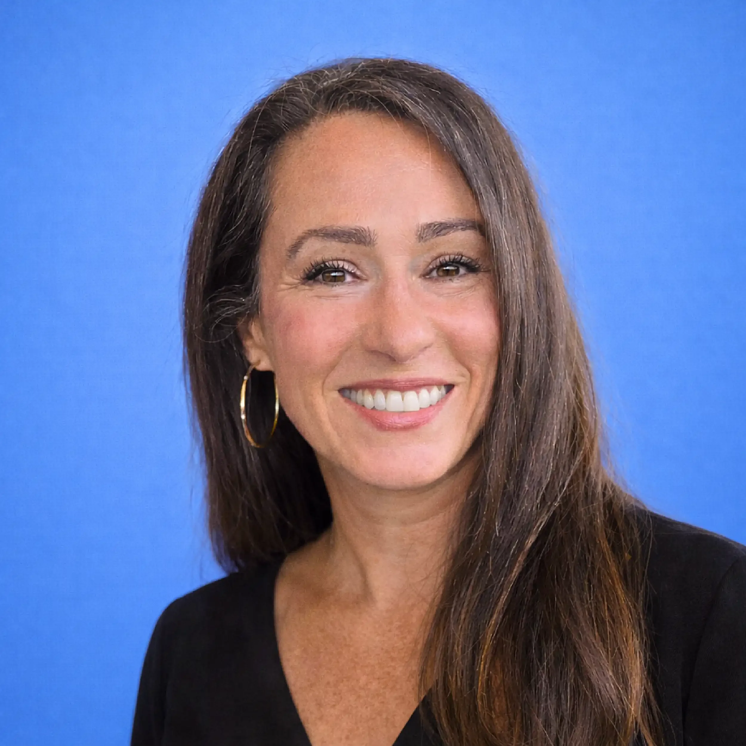 A headshot of Caryn Jenneve