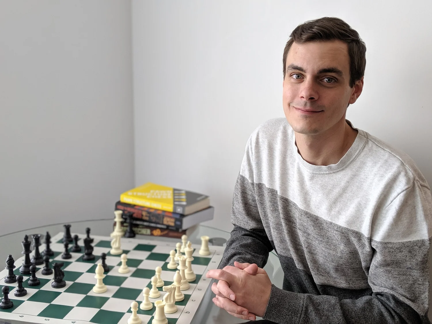 Peter Lambert seated at a chessboard