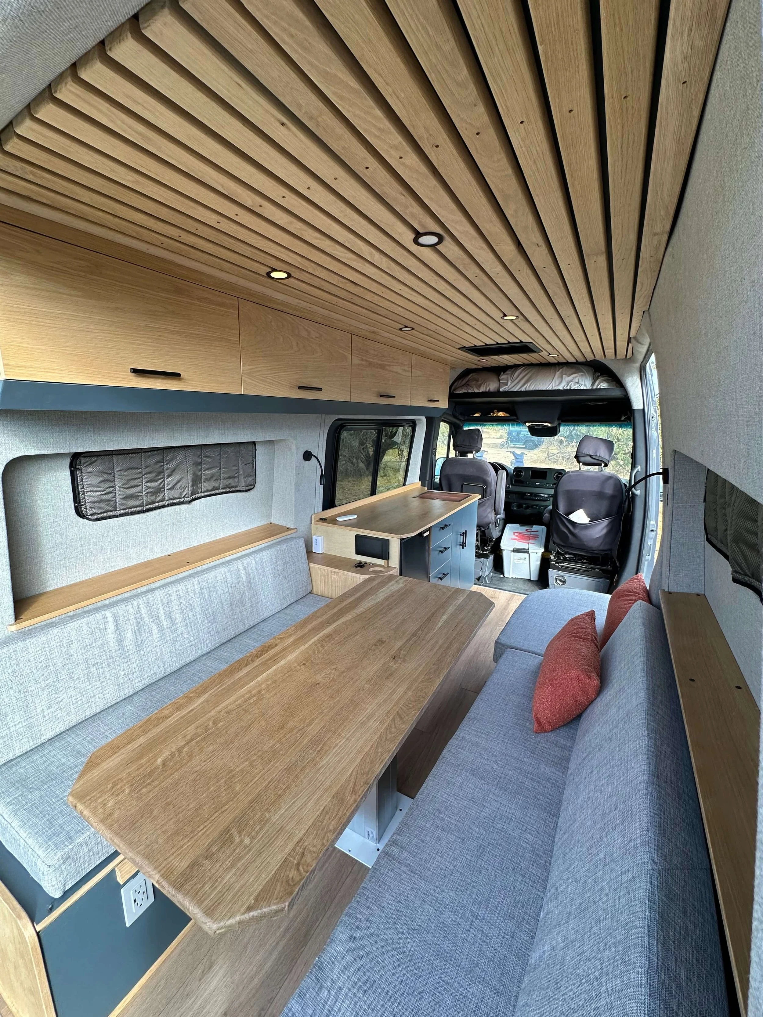 yolo-camper-vans-int-van-light-wood-dining-area.JPG