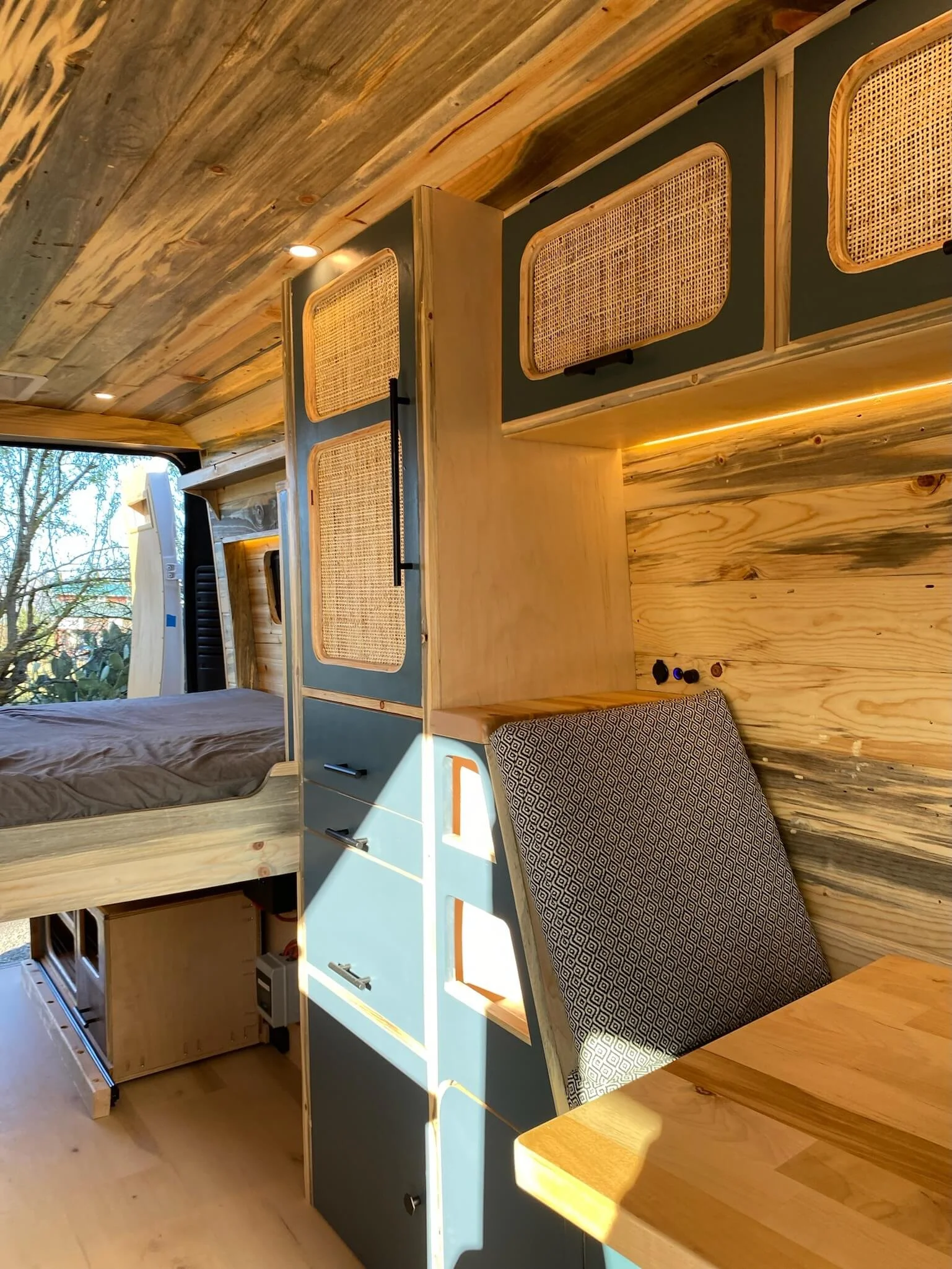 yolo-camper-vans-int-van-seating-area-storage.JPG