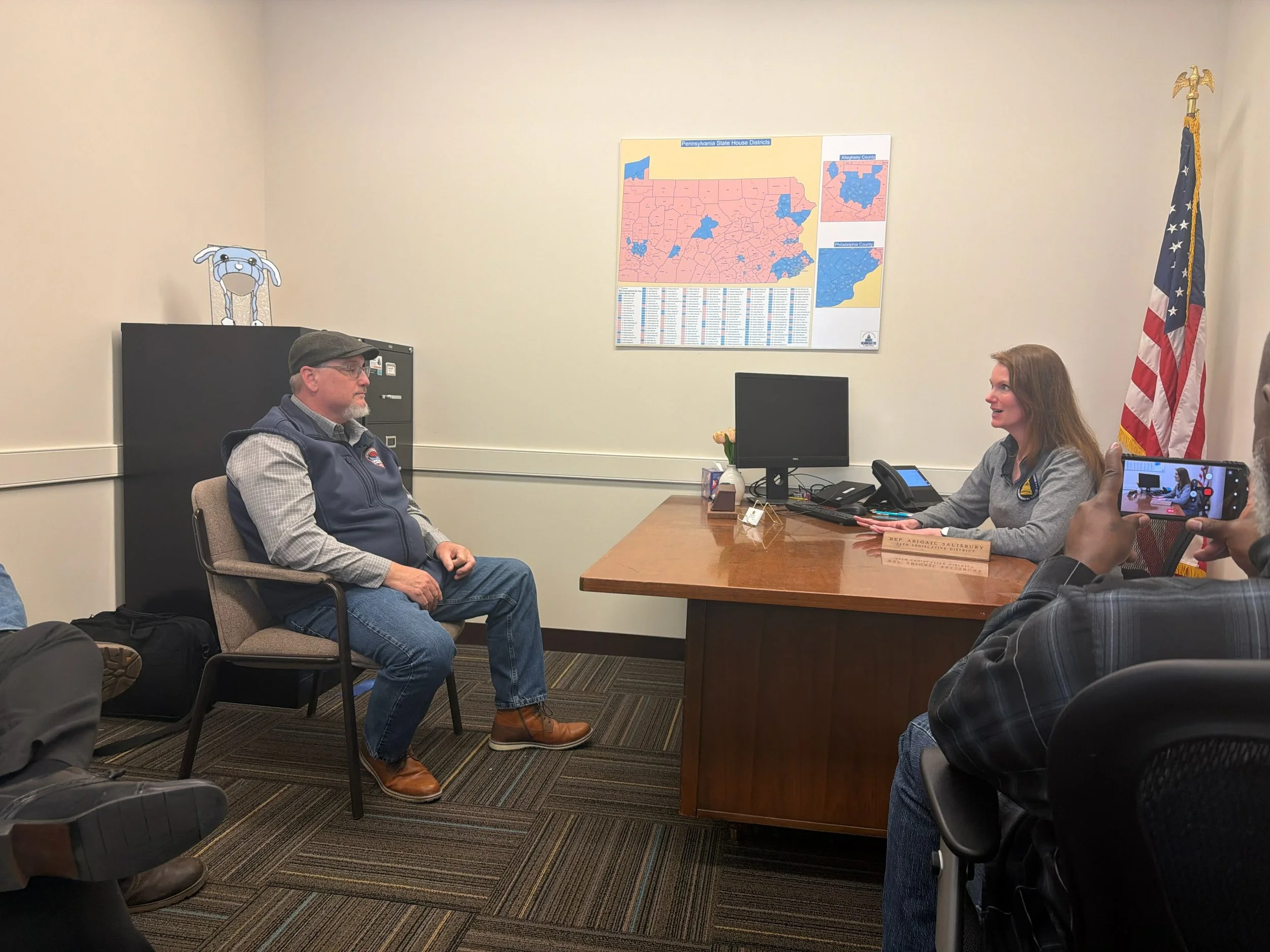 Business Manager Barry Hixson discusses the need for transparency and accountability from electric utilities with State Representative Abigail Salisbury (D-Allegheny County)