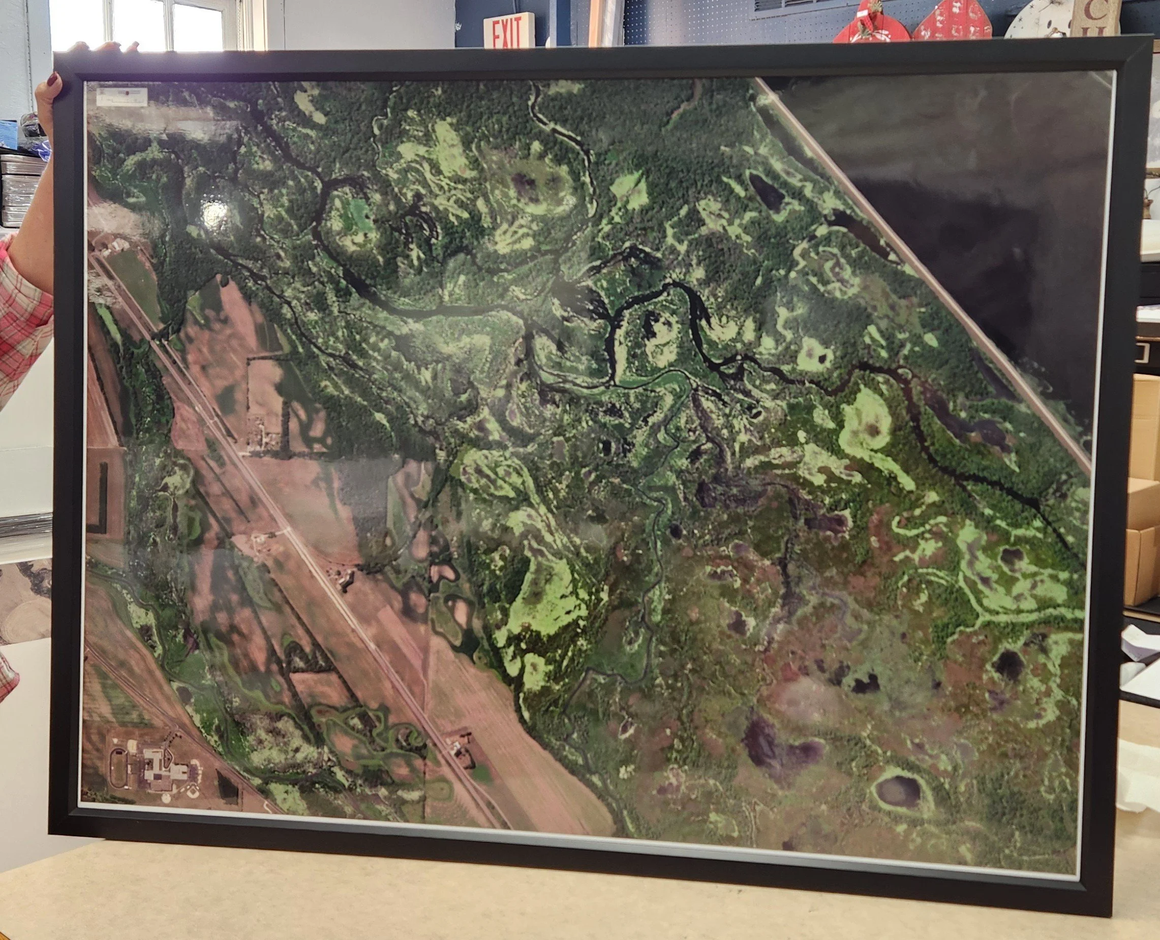 Aerial footage of farmland. Acres of property. No mat