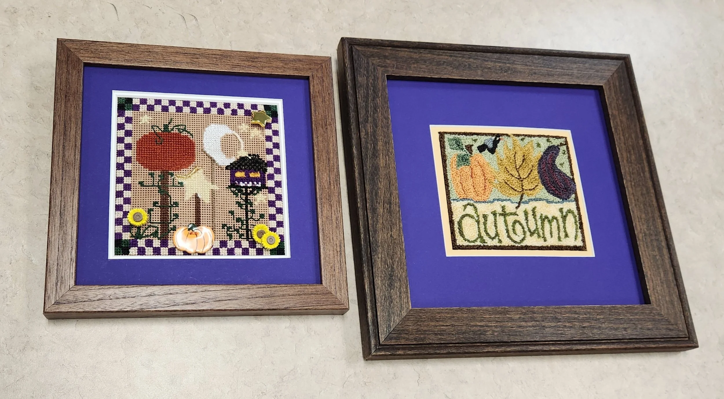 Two Cross-stitch patterns with a mat and framed