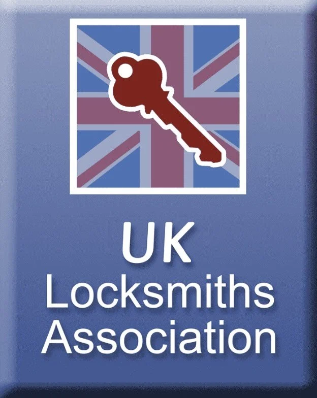 Logo of UK Locksmiths Association featuring a key and the Union Jack flag background.