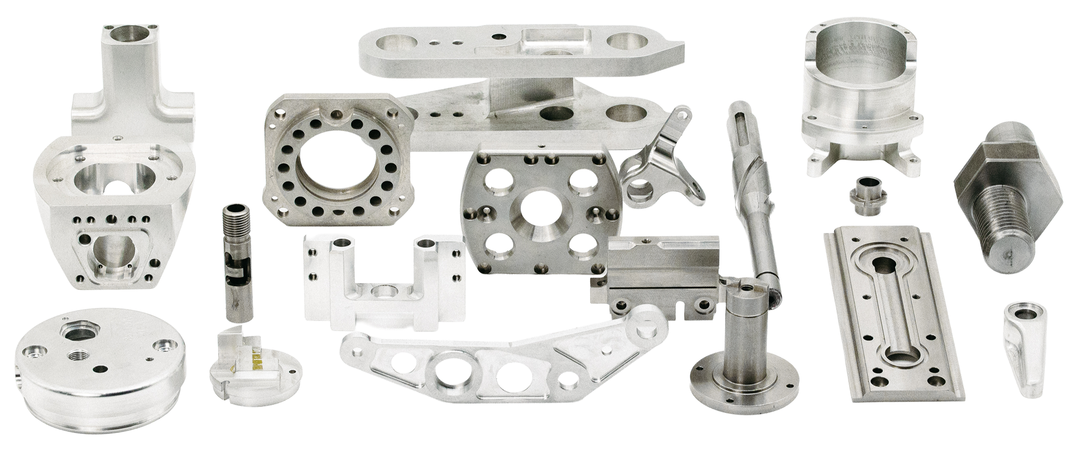 A diverse collection of small precision-milled components showcasing different materials and complex machining capabilities