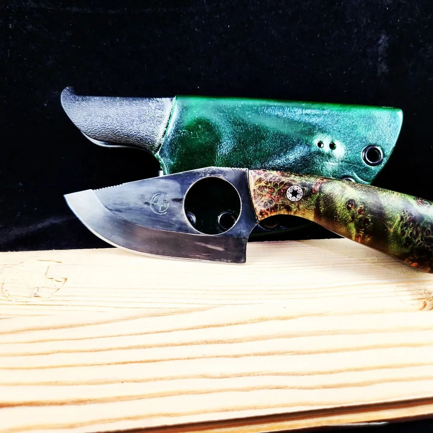 This is a skinner I made for my brother in law. 1084 steel and another dyed maple burl handle. This sheath is kydex that is wrapped in leather.