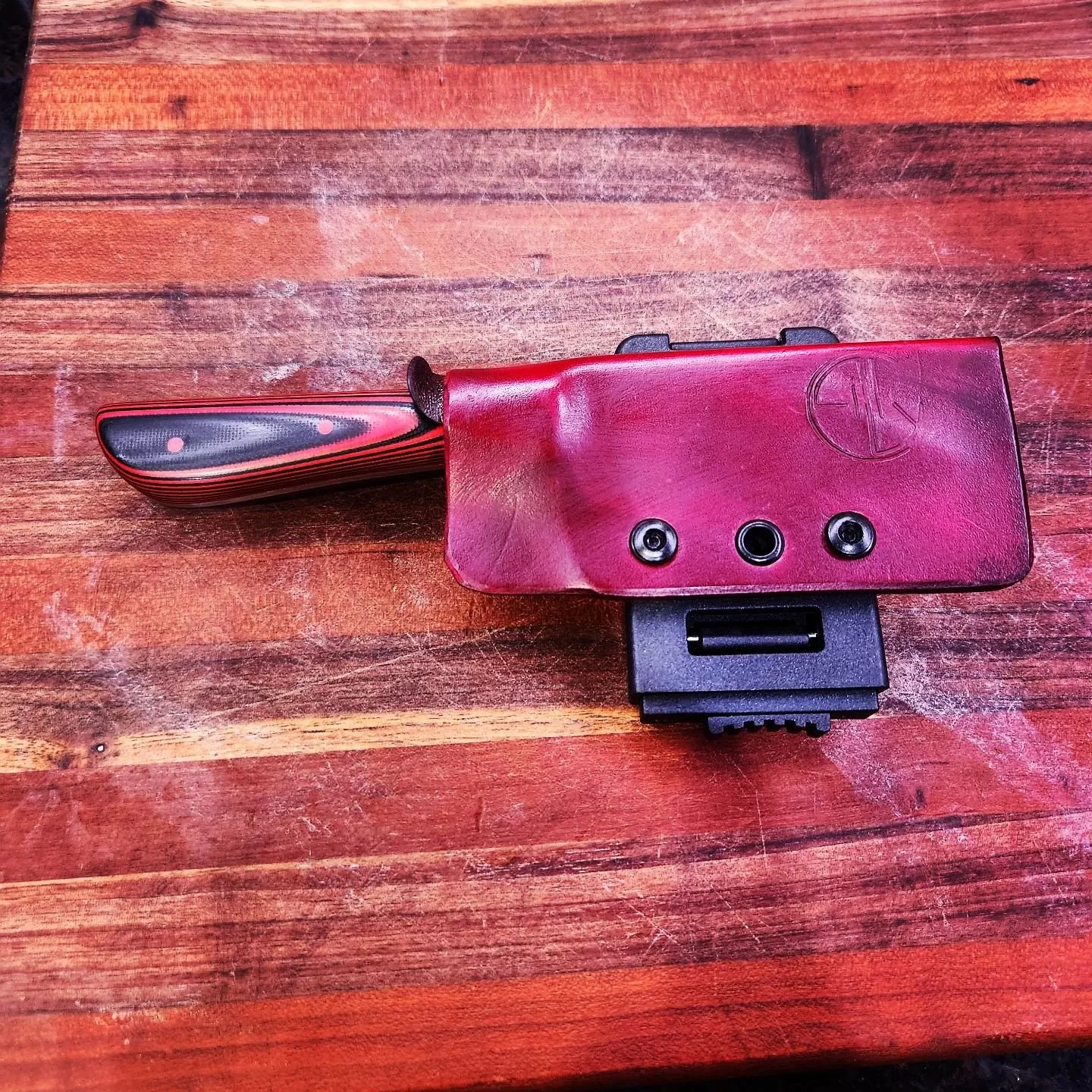 this is a kydex wrapped in leather I made for my son for his knife.