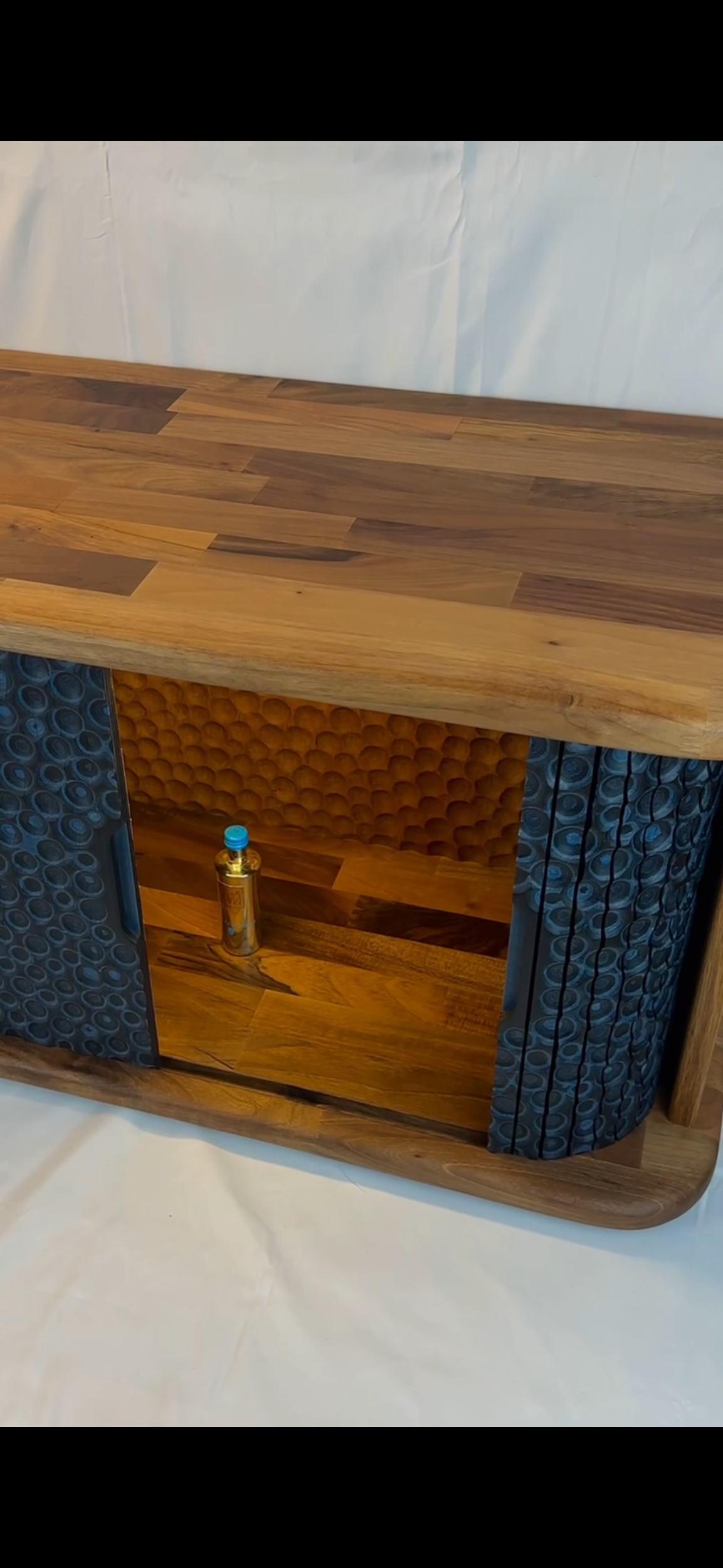 “Trypophobia” denim tambour liquor cabinet