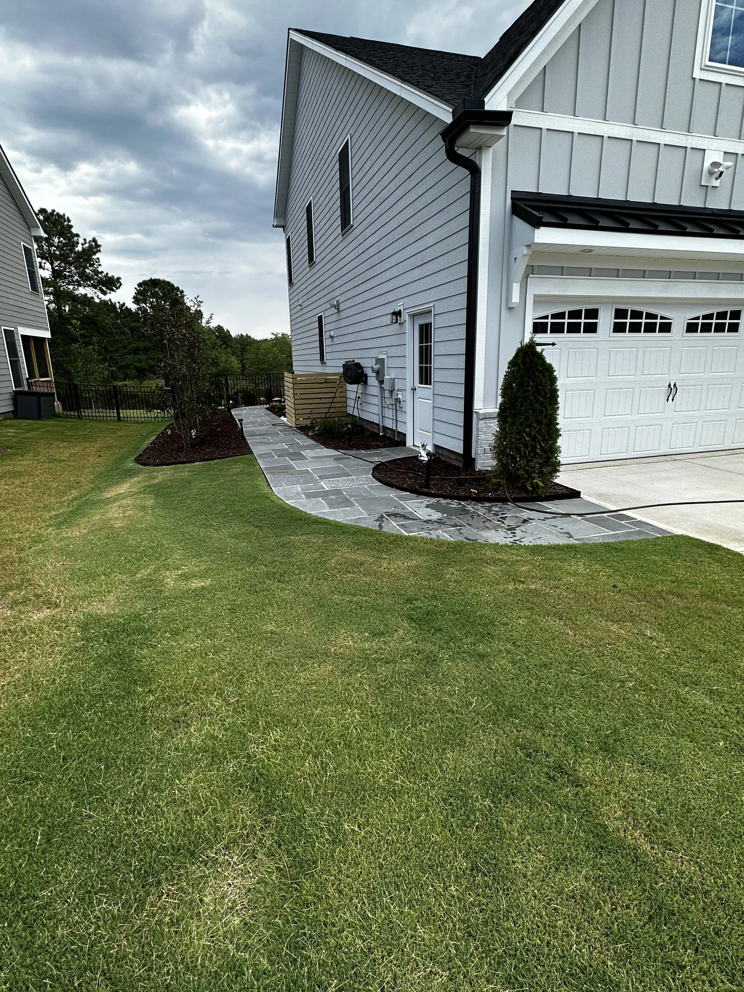 Oranssi technician working on a roof project