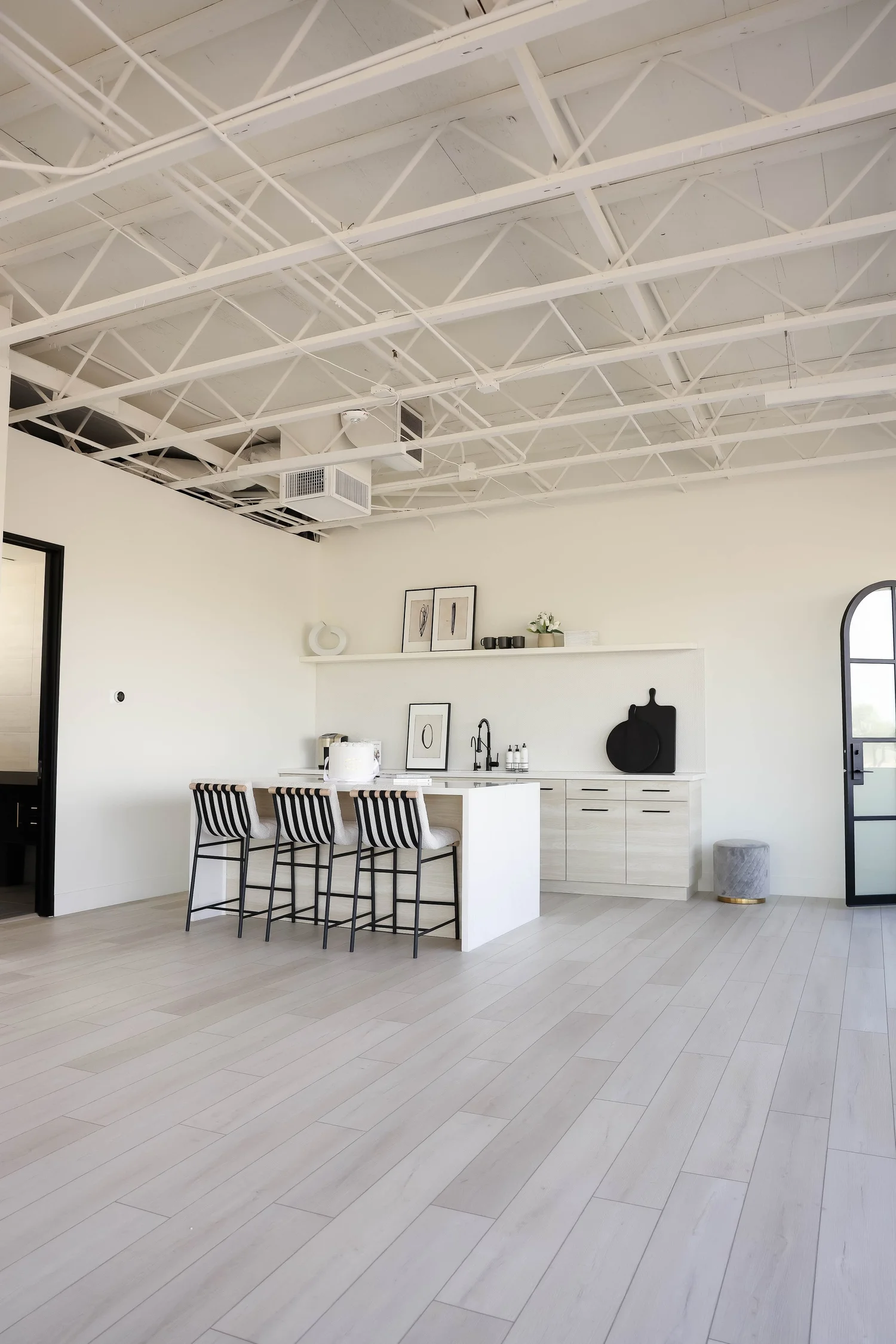 Elegant archway setup at 480 Natural Light Studio for a micro wedding ceremony